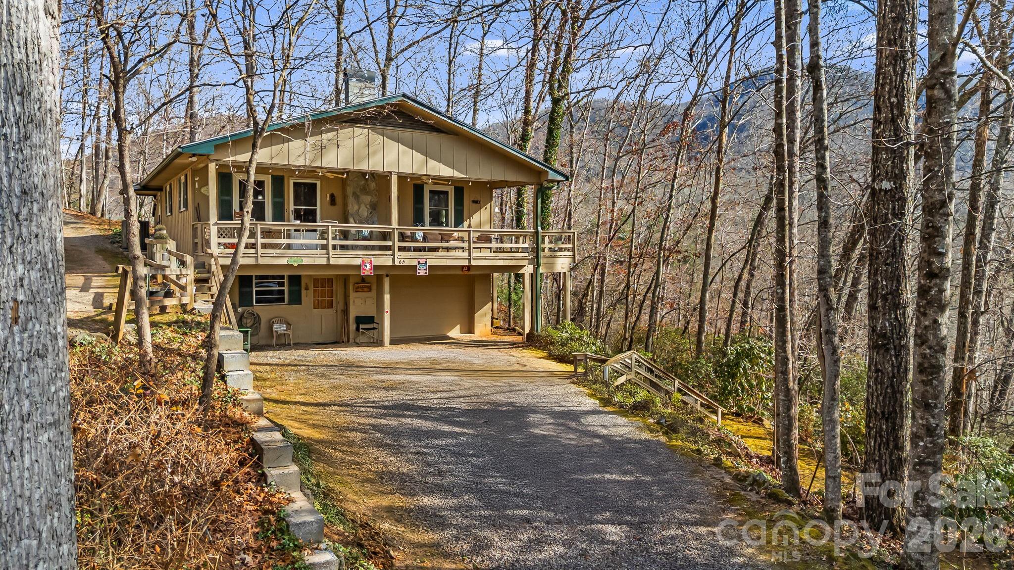 Welcome home to this charming mountain cottage perfectly located in an area near Black Mountain and Old Fort. This property is ideal for the buyer seeking a peaceful mountain setting. The property has a spacious layout, 3-bedroom, 2 full and 1 half-bathroom home features a functional split floor plan designed for comfortable daily living. The basement level includes a generous 1-car garage and an adjacent workshop, providing ample room for storage, vehicle parking, projects, and hobbies. Enjoy peace of mind with a private well, an updated heat pump, and a propane gas heater for supplemental warmth. Newer appliances complete the move-in-ready package. Quiet mountain lifestyle awaits nestled in a wooded area, the cottage offers a sense of privacy that is increasingly hard to find. Enjoy peaceful, secluded mountain living, along with winter mountain views from the front porch and upper-level windows. If you value privacy and a beautiful mountain setting, this property is a must-see! Opportunity to expand: Total acreage 2.53 with three separate lots. Refer to plat map for lot 10 and 4. Lot 11 is available and sold separately. No drive by's.
