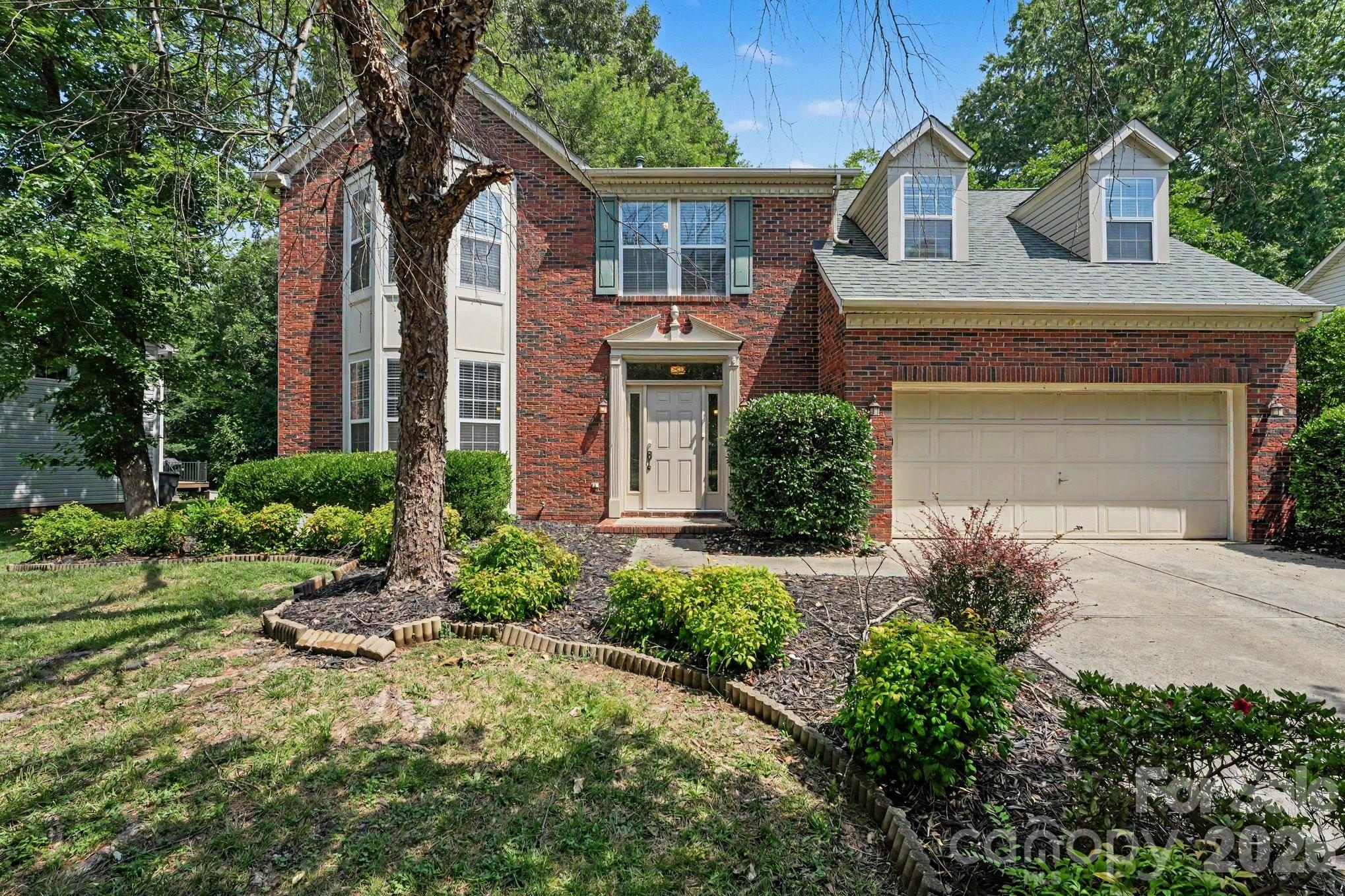 Move-in ready three-bedroom, 2.5-bathroom home in the quiet Wedgewood North neighborhood.
The home features a traditional floor plan with a well-sized front room that flows seamlessly into the dining room and kitchen. Vaulted ceilings in the living room make the living and kitchen space—which comes fully equipped with granite countertops and stainless steel appliances—feel enormous. An open upstairs loft area looks down into the living area, keeping the home feeling well-connected.
This versatile loft space serves as a perfect secondary living area or study and conveniently features an attached laundry room and hall closet. The remaining bedrooms and bathrooms are also located on the second level, offering a dedicated upstairs living arrangement. Outside, the property boasts a large, fenced-in backyard perfect for grilling, gardening, or outdoor activities. This charming home is conveniently positioned near shopping and interstates, offering multiple back-road routes to Charlotte.