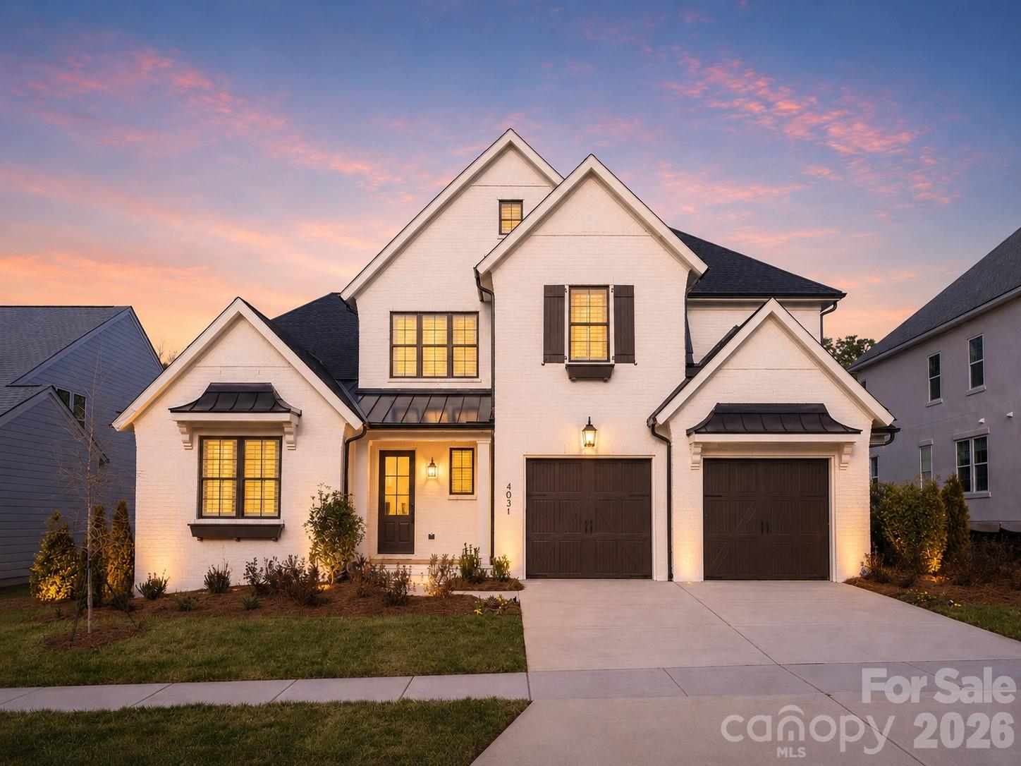 An exceptional opportunity to build a brand-new home on one of Plaza Midwood's most coveted streets — Country Club Drive.  This is a proposed listing for this lot with the Monterey (L) Floorplan but buyers select from a curated collection of nine architect-designed floor plans and personalize their home's finishes, fixtures, and selections through an on-site design studio — delivering a truly personalized new home experience in one of Charlotte's most desirable neighborhoods. This .40-acre wooded, level homesite is among the largest available in the neighborhood, offering the rare combination of a generous, private backyard and a prime intown Charlotte location that is virtually impossible to find in today's market. Homes are priced starting around $1.8M including lot. The location is unmatched for intown living. Charlotte Country Club — home to a Donald Ross-designed 18-hole golf course, 10 clay tennis courts, 8 pickleball courts, a 5-pool complex, and one of Charlotte's most storied clubhouses — is just 0.4 miles away. Midwood Park, a beloved 6-acre neighborhood gathering spot with a playground, tennis, basketball, amphitheater, and community garden, is just steps from your door. Plaza Midwood's eclectic restaurant scene, boutique shops, galleries, and the Common Market are 1.5 miles away, and Uptown Charlotte is just 3 miles from home. Commuters and city enthusiasts alike will appreciate the proximity to NoDa, major highways, and the Scout Motors headquarters — putting the best of Charlotte's east side within easy reach. Served by Charlotte-Mecklenburg Schools. Do not walk the lot without a scheduled appointment. Contact listing agent for available floor plans, site plan, and build program details.