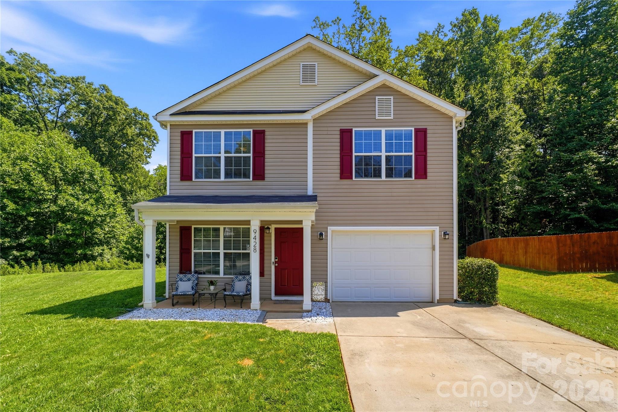 Welcome to this LOVELY two-story HOME tucked away on a spacious .37-acre CUL-DE-SAC LOT with mature trees along the backyard perimeter, creating a peaceful and private setting. Enjoy the charm of a ROCKING CHAIR FRONT PORCH, a generous backyard, and outdoor spaces perfect for relaxing, grilling, or entertaining. Inside, the home offers a comfortable and functional layout with a....Let's stay HOME Family Room, a large Kitchen with Prep Island, Dining Area, and wonderful natural light. The kitchen has been enhanced with recent updates which include: recessed lighting, new range, new dishwasher, new refrigerator, new sink, and updated fixtures, plus a lovely Chandelier over the dining table. Upstairs, the Spectacular Primary Bedroom Retreat features vaulted ceilings, generous space, and a private Ensuite bath. Secondary bedrooms are nicely sized, including one currently used as an office with added recessed lighting. Additional recent updates also include new LVP flooring throughout the second floor and a new NEST thermostat. Conveniently located near shopping, dining, daily conveniences, and major commuter routes including I-77 and I-485. The Stainless steel refrigerator conveys, and CPI security equipment, including control pad and rear camera, also conveys. A wonderful blend of space, privacy, comfort, and convenience!  THIS IS IT!