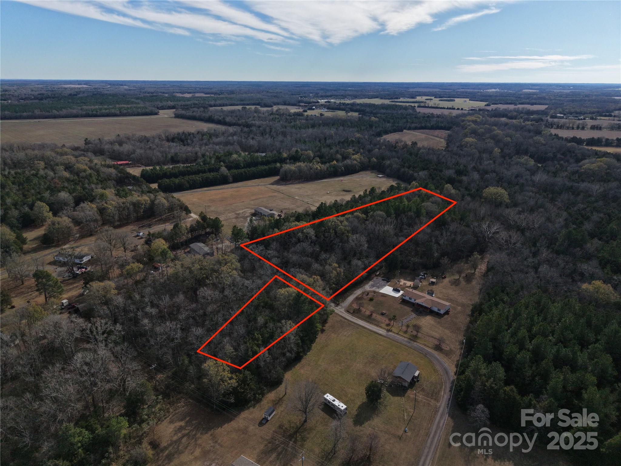 An excellent opportunity to develop 5 unrestricted acres in Rock Hill!  Tucked off a private street in an excellent location, this lot would be suitable for a new build, manufactured homes, small farm, and more.