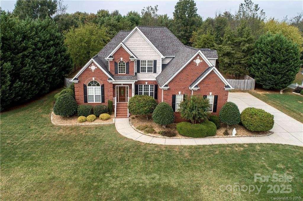A must see!! Rare find in Monroe, full brick on over an acre lot close to Dining and Shopping. Some features of this well maintained home are an Open Floorplan, 2 Story Great room, First floor Master Suite w/sitting room, walk-in closet and garden tub. Hardwoods on the Main Floor. Gourmet kitchen with 42" cabinets, Granite countertops, Gas Range w/Convection Oven and Tile backsplash. 2 bedrooms upstairs with walk-in closets Large bonus room with Pool Table and built in Mini Fridge. Large Screened in patio w/stamped concrete and TV. Beautiful landscaped front yard with irrigation and outdoor lighting. Fully fenced backyard with gas grill and large garden. Also Washer/Dryer will stay. Hurray, this beautiful home will not last long!!