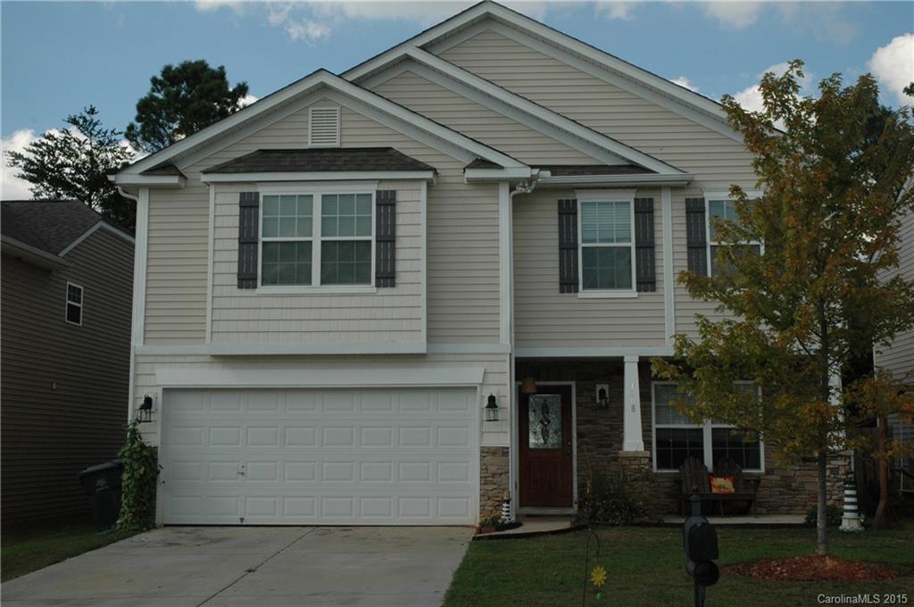 Wonderful family neighborhood with a Pool!. New Roof 2014. Fun fenced in backyard with large shed/workshop. The lot backs up to woods so no neighbors behind for privacy. Lovely front porch for rocking or swinging. Hot tub IS included! Ready to move in! Convenient to Ballantyne with the benefit of low SC Lancaster County taxes and great schools. USDA financing!