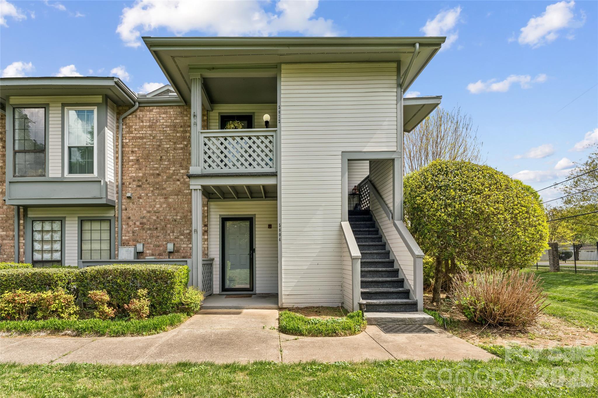 2BR condo in Harris Lake. Open Floor plan with a high vaulted ceiling Great room that has a brick fireplace, with gas logs.  An end unit, located on the second floor, you won’t have a resident  living above you. Spacious layout with large bedrooms. 
Open the drapes in the morning and enjoy the natural light through the generously sized newer windows, and sliding doors to the deck. 
A great, central location close to a lot of Charlotte attractions: NoDa, Midwood & Reedy Creek Park are all within 10 minutes. Uptown, University area & Optimist Hall are 15 minutes away, and Concord Mills & Camp North End are 20 minutes. Also within walking distance of bus routes. 
Plenty of parking but residents must have a parking sticker.  
HOA recently replaced roofs & building exteriors. Seller replaced HVAC & windows.
Great opportunity for both homeowners and investors, as community has no rental caps, offering strong rental potential and excellent cash flow opportunities. No known rental caps but short term rentals (like AirBnB) are not allowed.