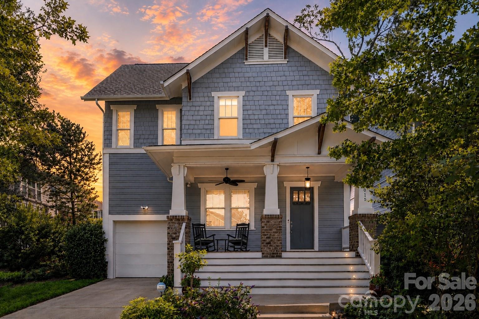 1.2 miles from uptown, this Cherry neighborhood craftsman offers city skyline views, exceptional walkability, and a backyard that backs onto a quiet green buffer. Enjoy an unbeatable location with Cherry Park at the end of the street and a less than 10-minute walk to Metropolitan dining and shopping including Trader Joe’s, Little Sugar Creek Greenway, Target, and the Kings Drive Farmers Market. 

Out front, a welcoming porch with new Trex stairs is the perfect spot to take in the sunset. 

Inside, 10-foot ceilings, hardwood floors throughout the main level, and an open-concept layout designed for entertaining. The spacious living area with custom built-ins flows seamlessly into the kitchen and dining space overlooking the backyard. The kitchen is equipped with ample quartz countertop space, a Café appliance suite including a new refrigerator, dishwasher, and microwave, and an oversized island perfect for gathering. 

A dedicated and spacious home office provides an ideal work-from-home setup on the first floor.

Upstairs, the spacious primary suite features a large walk-in closet with custom built-ins and a luxurious en-suite bath with a soaking tub, walk-in shower, and oversized linen closet. Three additional bedrooms, including one with a private en-suite bath, plus a large laundry room complete the upper level.

The generous one-car garage connects to an oversized mudroom with custom cabinetry for exceptional organization. The floored attic provides additional storage space.

Step outside to relax and enjoy the recently renovated screened-in back porch, a beautifully landscaped backyard and additional common landscaped green space just beyond the fence.

Other recent improvements include updated light and ceiling fan fixtures, extensive landscaping including Japanese maples and Green Giant arborvitaes, full interior and exterior paint, French drains, updated porch stairs decking, and plush new carpet — all completed in 2025–2026. 1.5% Closing cost credit with preferred lender! A rare opportunity to own in one of Charlotte’s most walkable, connected neighborhoods.