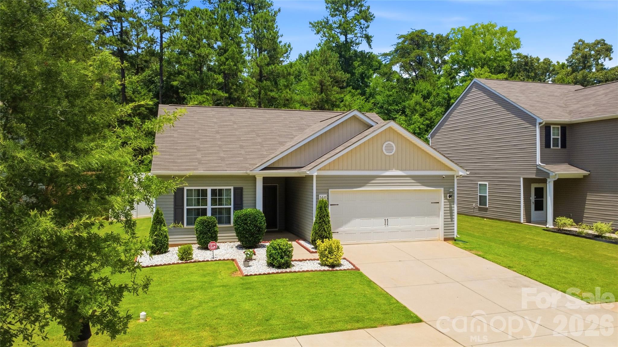This METICULOUSLY MAINTAINED, one owner beauty is RIGHT-SIZED and has an OPEN, SPLIT-BEDROOM floor plan designed for comfort, privacy, and easy everyday living. A charming PORTICO leads to the entry, where a beautiful BEVELED-GLASS front door sets the tone for what’s inside.  The Heart of the Home is the bright, well-appointed kitchen featuring GRANITE countertops, an  ISLAND for casual dining, STAGGERED WHITE CABINETRY, and appliances that show exceptional care! The Dining Area comfortably accommodates gatherings, while the Open Family Room offers VAULTED CEILINGS, an upgraded CEILING FAN, and a relaxed flow that makes entertaining simple. The SPACIOUS Primary Bedroom & Ensuite is a comfortable and relaxing retreat.  At the end of your day, YOU simply retire to your abode and... relax, rest, renew and repeat! Secondary bedrooms are thoughtfully positioned on the opposite side of the home, providing flexibility for family, guests or a home office. Now step outside, the fully fenced backyard is a true standout with an oversized patio, attractive landscaping, peaceful wooded backdrop, and storage shed that conveys. Whether you’re entertaining, enjoying morning coffee, or winding down after a long day, this outdoor space delivers.

Refrigerator, Nest thermostat, and CPI security equipment convey. Beautiful curb appeal, a practical layout, a private backyard, and a convenient Charlotte location — this home checks the boxes!