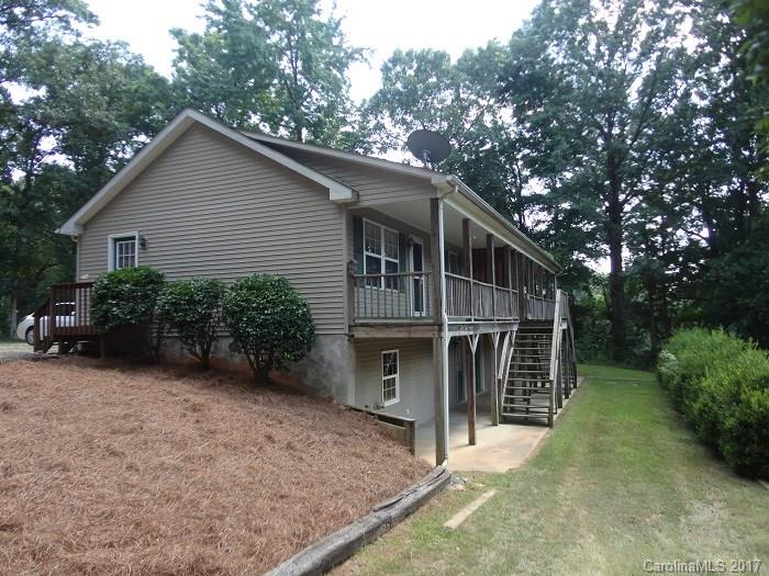 MOVE-IN READY duplex unit near Lake Norman For Rent (Unit #A)! Main level has Living Room, Dining area, Kitchen, 2 Bedrooms & 1 Full Bath. Unfinished Basement has Laundry hook-ups & tons of space for storage or workshop. Enjoy a serene setting from the Covered Front Porch and basement Patio. Gravel driveway with parking for 2 vehicles. Tenant is responsible for all utilities and lawn maintenance is included! No Smoking and 1 Pet under 35-lbs is conditional with a $250.00 non-refundable pet fee.