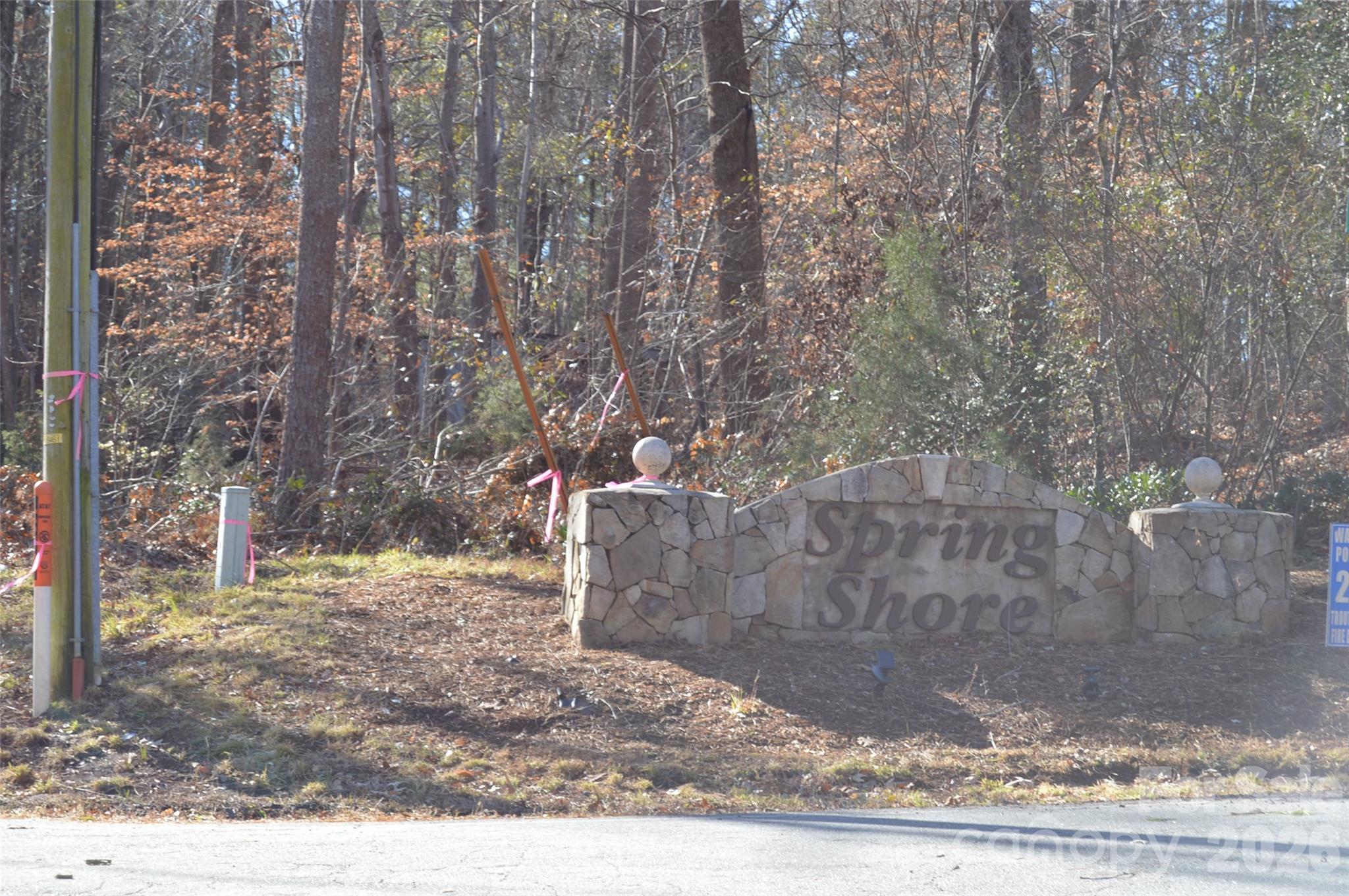 Unlock the exceptional potential of building a dream home on Sunset View Lane. This listing includes multiple lots; lot number 57 & 58 must be combined to have a buildable lot for a single-family residence for septic purposes and lots 81 & 62 are being conveyed with this listing. The residents of Spring Shore Development enjoy close access to Lake Norman State Park with walking trails, and recreational facilities. The neighborhood has a community boat ramp and a day dock. A community well is available with a tap fee.