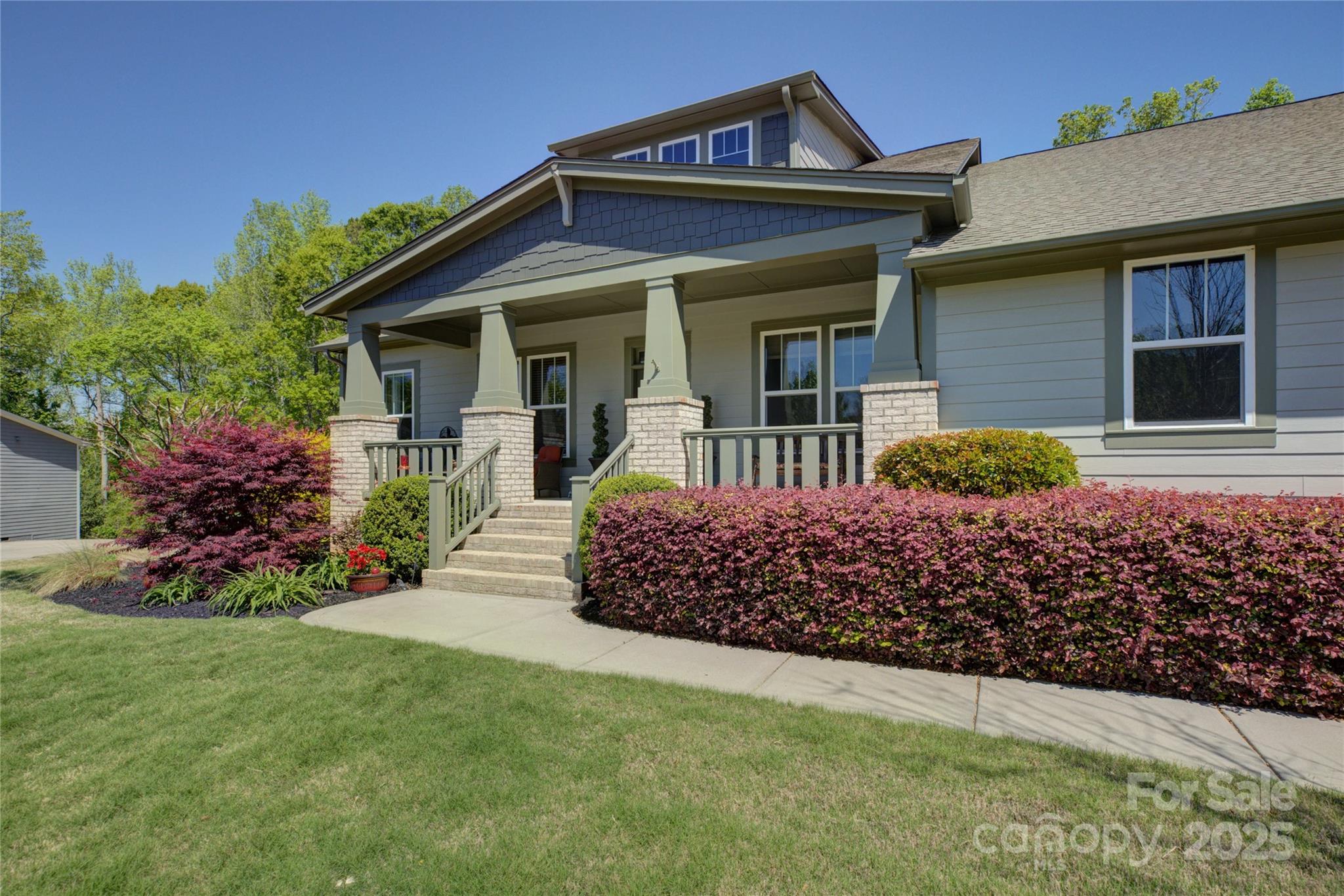 Luxury 1.5-story home in Fort Mill’s desirable Massey neighborhood. Built in 2017 with stone and fiber cement siding, this home offers 6,024 heated SF, 4 bedrooms, and 5.5 baths. Main level features 2,933 SF with hardwoods throughout, formal dining, office with French doors, and a spacious great room with a stone gas fireplace. Chef’s kitchen includes gas cooktop, granite, double convection wall ovens, walk-in pantry with wood shelving, and walk-in laundry. Main-level primary suite offers spa-style bath with oversized tiled shower, garden tub, and dual walk-in closets. Two additional en suite bedrooms on main. Upstairs: loft, guest suite, and full bath. Walkout basement adds 2,376 SF of heated living with rec room, fitness area, flex space, and full bath—ideal for separate living. Outdoor living shines with 26'x10' covered porch, patio, fenced yard. 3-car garage, extended drive, and high-end finishes throughout. Neighborhood amenities: clubhouse, fitness, water park, playground & more.