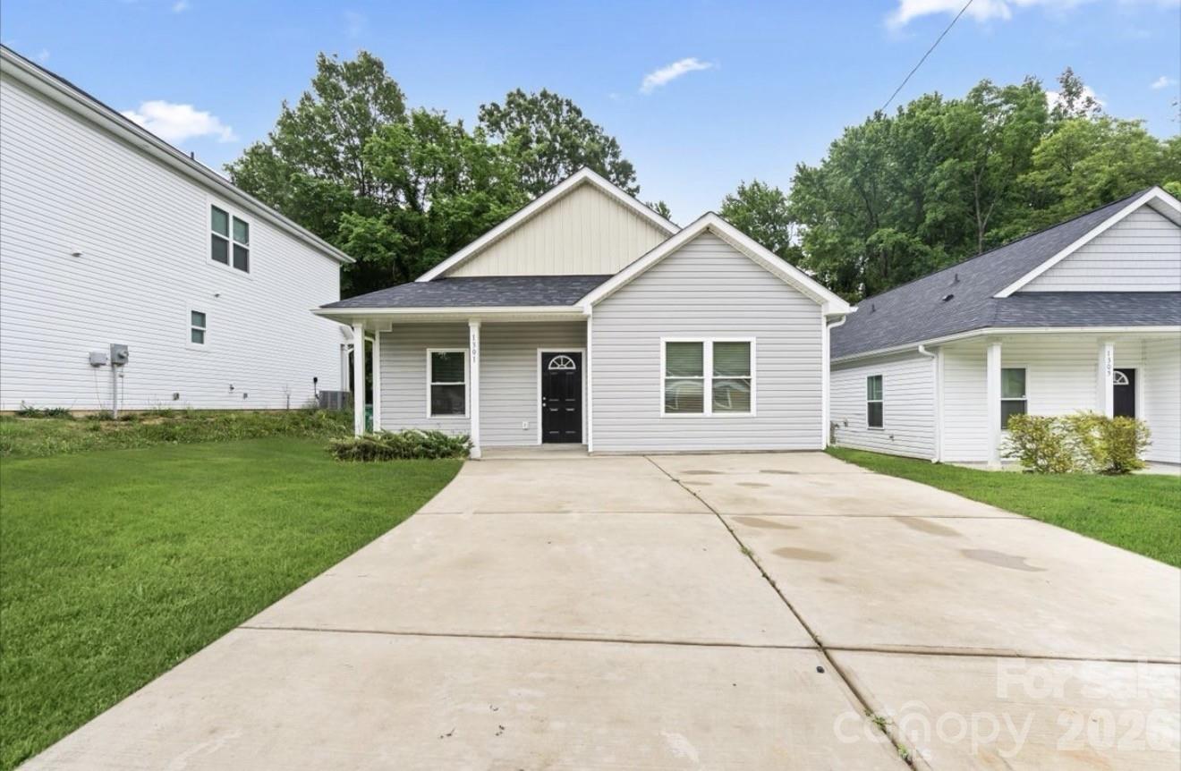 Welcome to this beautiful 3-bedroom, 2-bath home in Charlotte, offering modern finishes and a move-in ready feel throughout. The open-concept layout features a bright living area, updated flooring, neutral paint, and a stylish kitchen with white cabinets, granite countertops, stainless steel appliances, subway tile backsplash, and a spacious island perfect for everyday living. The bedrooms offer comfortable space, and the bathrooms include clean modern finishes with granite countertops. Conveniently located near shopping, dining, and major roads, this home is a great opportunity for buyers looking for comfort, style, and value.