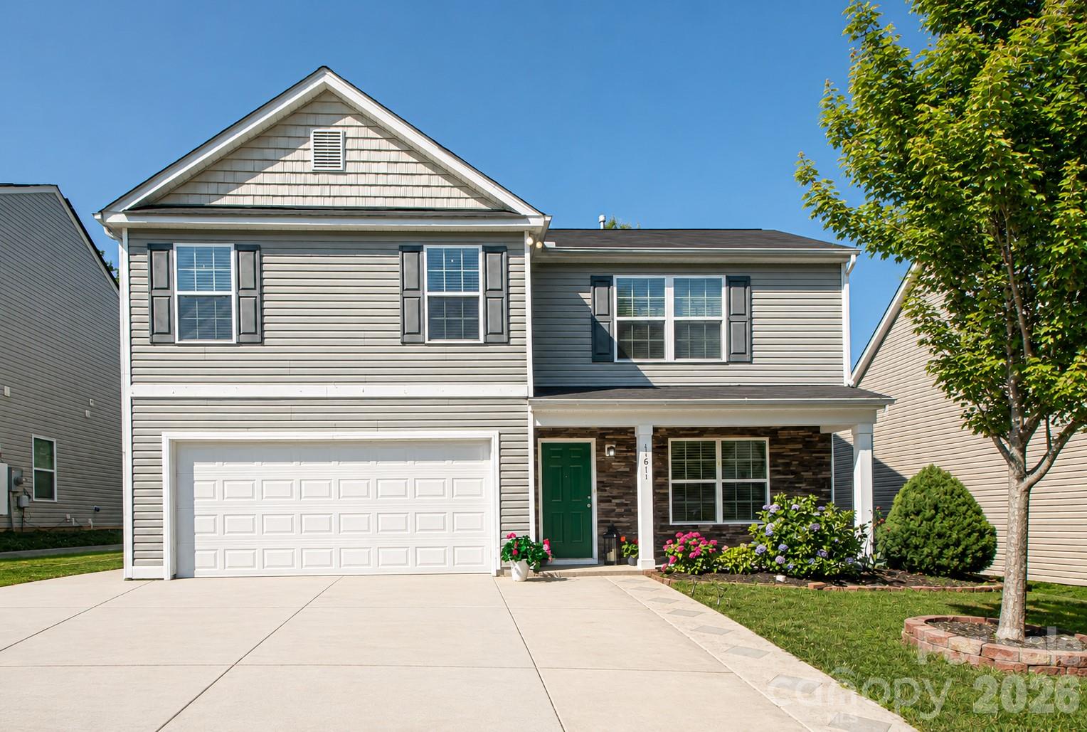 Beautifully updated and move-in ready 5-bedroom, 3-bath home featuring a private, fully fenced backyard with an expanded paver patio—perfect for entertaining or relaxing outdoors.  The spacious kitchen offers upgraded cabinetry with brushed nickel hardware, granite countertops, pendant lighting, and six recessed lights that create a bright and inviting space. A versatile front room can serve as a formal dining room, living room, home office, or additional sitting area.  The open-concept family room and breakfast area overlook the backyard and feature a sliding glass door leading directly to the patio. A main-level bedroom and full bath provide the perfect setup for guests or multi-generational living.  Upstairs, you'll find four additional bedrooms and two full bathrooms, including a spacious primary suite with a tray ceiling, custom shelving, and an oversized walk-in closet. The primary bath features a garden tub, separate shower, dual vanities and linen closet. The conveniently located upstairs laundry room adds to the home's functionality.  Tile flooring throughout the main level and luxury vinyl plank flooring on the stairs and upper level provide both durability and style. Enjoy the large, private backyard with plenty of room for pets, play, and outdoor gatherings.  Ideally located just 15 minutes to Charlotte Douglas International Airport, and the U.S. National Whitewater Center, 20 minutes to Uptown, 5 minutes to hwy 485, and minutes to recreational amenities of Lake Wylie, Rivergate, Steele Creek, Charlotte Premium Outlets, grocery stores, dining and parks. This home offers convenience, comfort, and an exceptional lifestyle.  Community amenities include pool.  Must see!