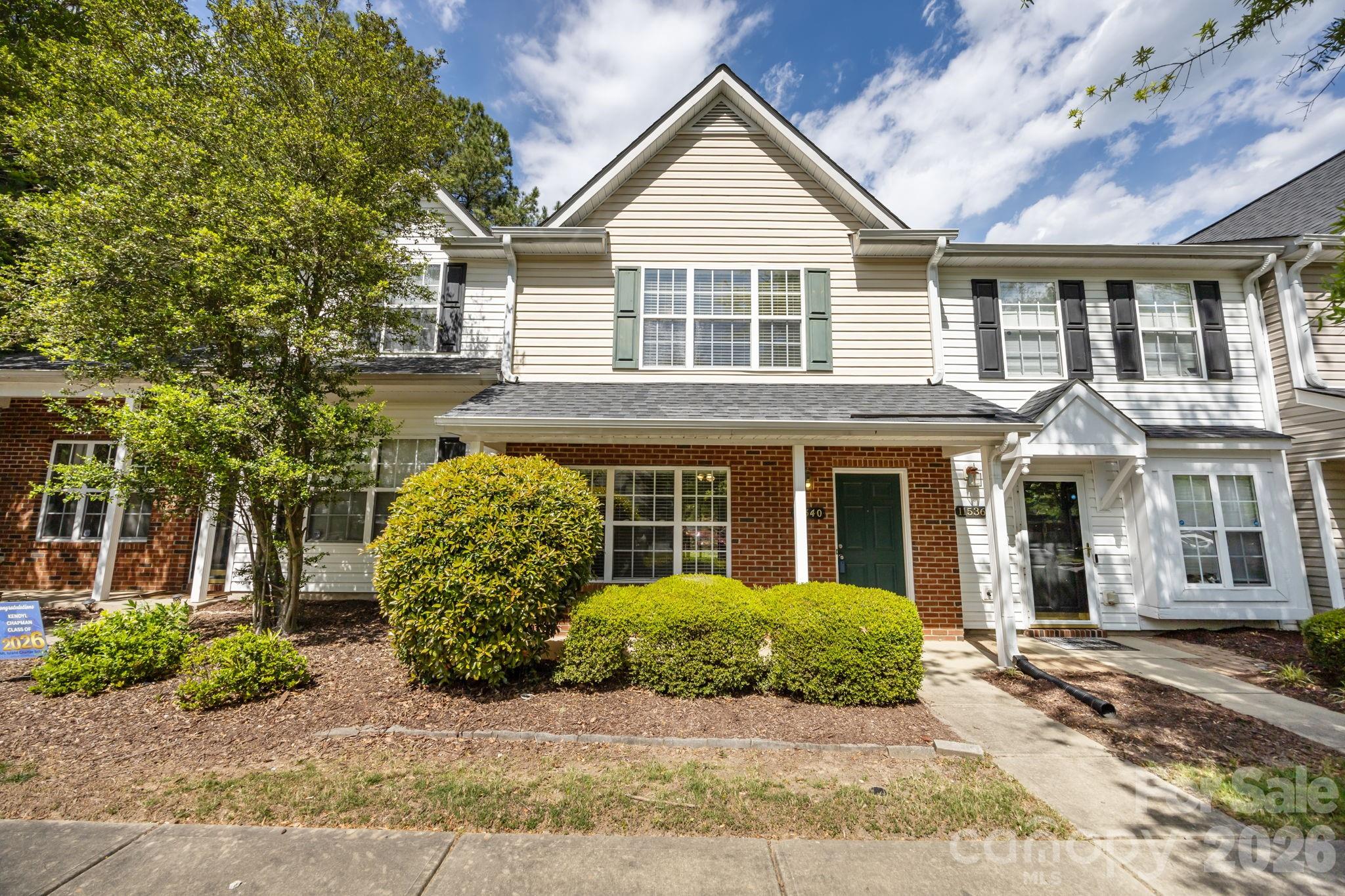 Welcome to 11540 Briddle Hall Court, a beautifully maintained townhome tucked into a quiet community in Northwest Charlotte. This inviting two-story home offers the perfect blend of comfort, functionality, and low-maintenance living—ideal for first-time buyers, downsizers, or investors alike. Step inside to an open and airy main level designed for everyday living and easy entertaining. The spacious living room features a cozy fireplace, creating a warm focal point for relaxing evenings. Flow seamlessly into the dining area and well-appointed kitchen, complete with ample cabinetry, generous counter space, and an island that makes meal prep a breeze. Upstairs, you’ll find two generously sized bedrooms, each with its own private en-suite bathroom—an ideal setup for roommates, guests, or added privacy. Both suites offer large closets and abundant natural light, creating comfortable retreats at the end of the day. A convenient half bath on the main level adds extra functionality for guests. Enjoy outdoor living on your private patio, perfect for morning coffee or unwinding after a long day. The low-maintenance exterior and HOA-covered services allow you to spend more time enjoying your home and less time on upkeep. Located just minutes from I-485 and Brookshire Boulevard, this home offers quick access to Uptown Charlotte, the U.S. National Whitewater Center, and a variety of shopping and dining options in the nearby Northlake and Riverbend areas. Whether you're commuting or exploring the city, convenience is always within reach. Don’t miss this opportunity to own a move-in-ready home in a growing area of Charlotte with strong value and lasting appeal. Schedule your showing today and discover all that 11540 Briddle Hall Court has to offer. The seller is willing to pay one year of HOA dues at closing with an acceptable offer.