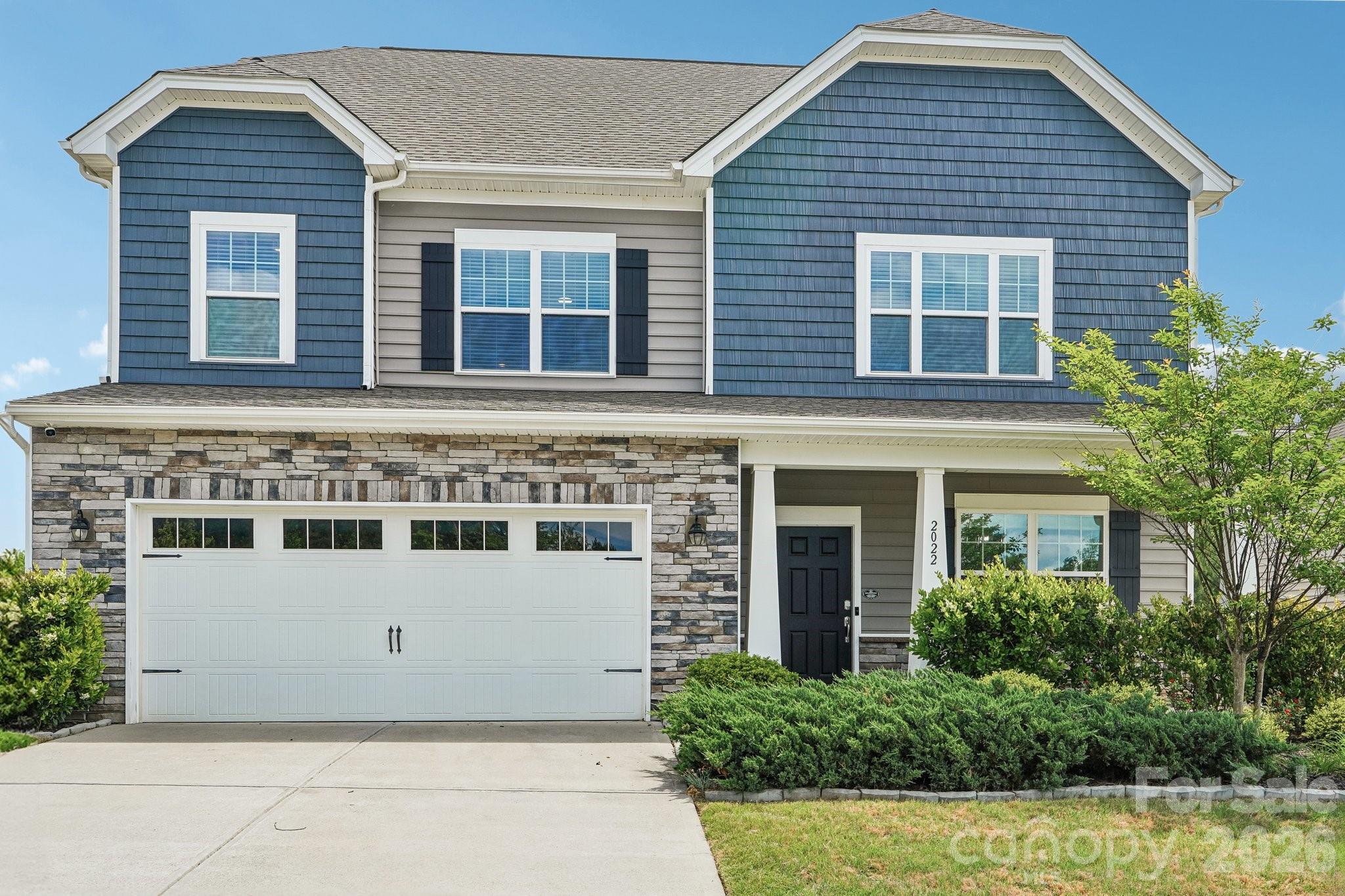 Rare opportunity to own one of the few 5-bedroom, 3-story homes in the highly sought-after Cuthbertson school district with over 3,200 square feet, paid solar panels, EV charging, and an outdoor new grill already in place. Move-in ready and available now/no waiting for new construction!  Welcome to this beautifully maintained home in the desirable Cortona community, offering the perfect blend of space, functionality, and modern convenience. The main level features a private office, spacious open-concept living area, and a gourmet kitchen complete with granite countertops, a large center island, stainless steel appliances w an Alexa enabled smart refrigerator, gas range, walk-in pantry, and abundant cabinetry. The inviting family room flows seamlessly into the dining area, creating the perfect setting for entertaining and everyday living.  Upstairs, retreat to the expansive primary suite featuring a spa-inspired bathroom with dual vanities, soaking tub, separate shower, and oversized walk-in closet. Three additional bedrooms and a versatile loft provide ample space for family, guests, hobbies, or work-from-home needs.  The finished third floor offers exceptional flexibility with a fifth bedroom, full bathroom, and spacious bonus area ideal for a media room, home gym, playroom, guest retreat, or multi-generational living.  Step outside and enjoy your own private backyard retreat featuring a custom outdoor built-in grill, perfect for hosting gatherings and creating unforgettable memories. Additional upgrades include paid solar panels, EV charging station, smart home features, crown molding, and upgraded finishes throughout.  Residents enjoy access to a clubhouse, fitness center, basketball courts, pickleball court, sidewalks, and recreational areas while benefiting from more moderate HOA fees than many amenity-heavy communities. Conveniently located near shopping, dining, parks, entertainment, and major commuter routes, this home offers easy access to everything Waxhaw and South Charlotte have to offer.  Unlike waiting months for a new build, this home is available now and includes thousands of dollars in premium upgrades already completed. Combining energy efficiency, versatile living space, top-rated schools, and an unbeatable location, this exceptional home is ready for its next owner.  Ask about a special lender promotion offering a 1% interest rate buy-down for qualified buyers who are under contract by June 30, helping to reduce monthly mortgage payments and increase affordability.