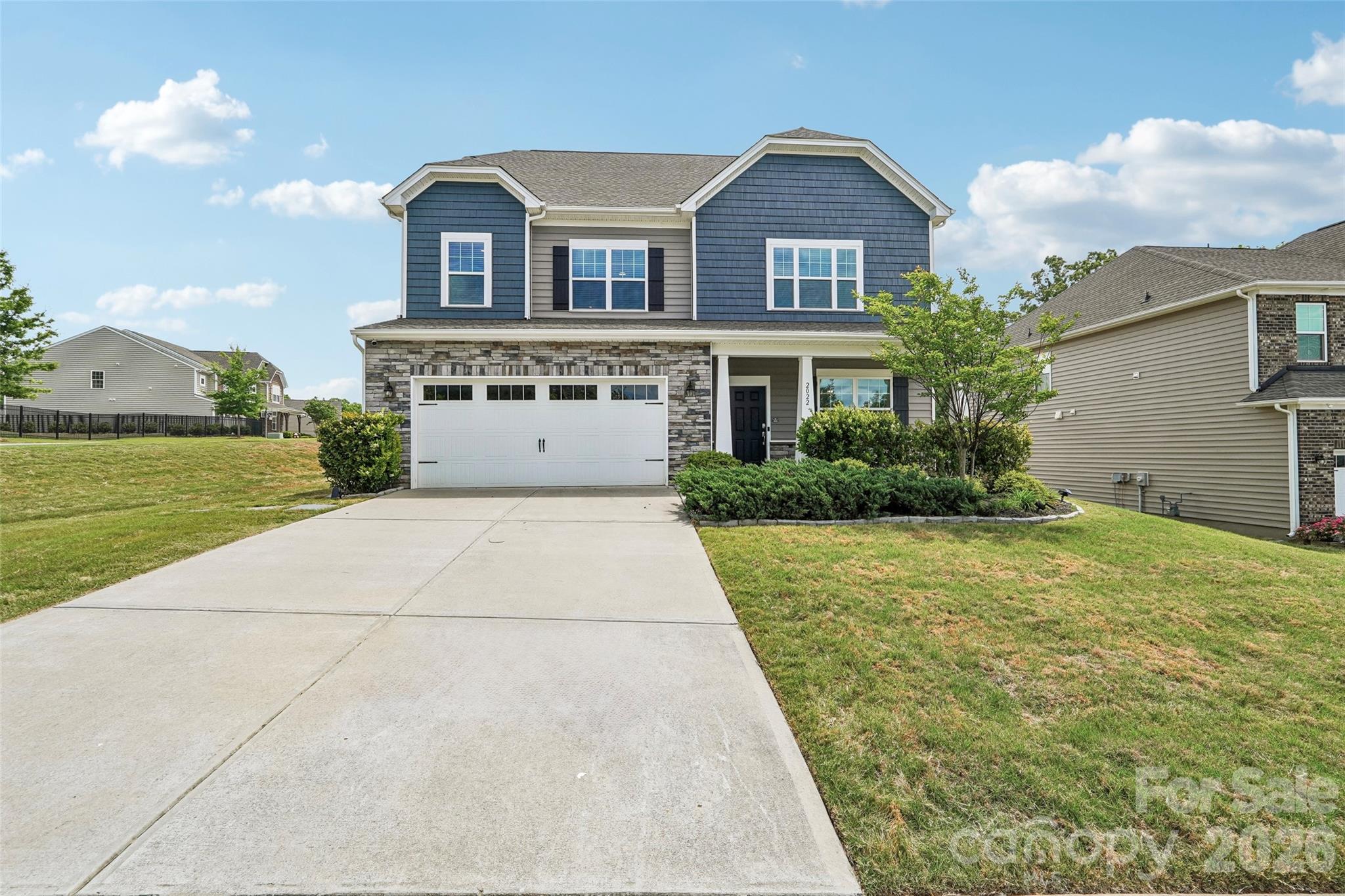 Rare opportunity to own one of the few 5-bedroom, 3-story homes in the highly sought-after Cuthbertson school district with over 3,200 square feet, paid solar panels, EV charging, and an outdoor new grill already in place. Move-in ready and available now/no waiting for new construction!  Welcome to this beautifully maintained home in the desirable Cortona community, offering the perfect blend of space, functionality, and modern convenience. The main level features a private office, spacious open-concept living area, and a gourmet kitchen complete with granite countertops, a large center island, stainless steel appliances w an Alexa enabled smart refrigerator, gas range, walk-in pantry, and abundant cabinetry. The inviting family room flows seamlessly into the dining area, creating the perfect setting for entertaining and everyday living.  Upstairs, retreat to the expansive primary suite featuring a spa-inspired bathroom with dual vanities, soaking tub, separate shower, and oversized walk-in closet. Three additional bedrooms and a versatile loft provide ample space for family, guests, hobbies, or work-from-home needs.  The finished third floor offers exceptional flexibility with a fifth bedroom, full bathroom, and spacious bonus area ideal for a media room, home gym, playroom, guest retreat, or multi-generational living.  Step outside and enjoy your own private backyard retreat featuring a custom outdoor built-in grill, perfect for hosting gatherings and creating unforgettable memories. Additional upgrades include paid solar panels, EV charging station, smart home features, crown molding, and upgraded finishes throughout.  Residents enjoy access to a clubhouse, fitness center, basketball courts, pickleball court, sidewalks, and recreational areas while benefiting from more moderate HOA fees than many amenity-heavy communities. Conveniently located near shopping, dining, parks, entertainment, and major commuter routes, this home offers easy access to everything Waxhaw and South Charlotte have to offer.  Unlike waiting months for a new build, this home is available now and includes thousands of dollars in premium upgrades already completed. Combining energy efficiency, versatile living space, top-rated schools, and an unbeatable location, this exceptional home is ready for its next owner.  Ask about a special lender promotion offering a 1% interest rate buy-down for qualified buyers who are under contract by June 30, helping to reduce monthly mortgage payments and increase affordability.