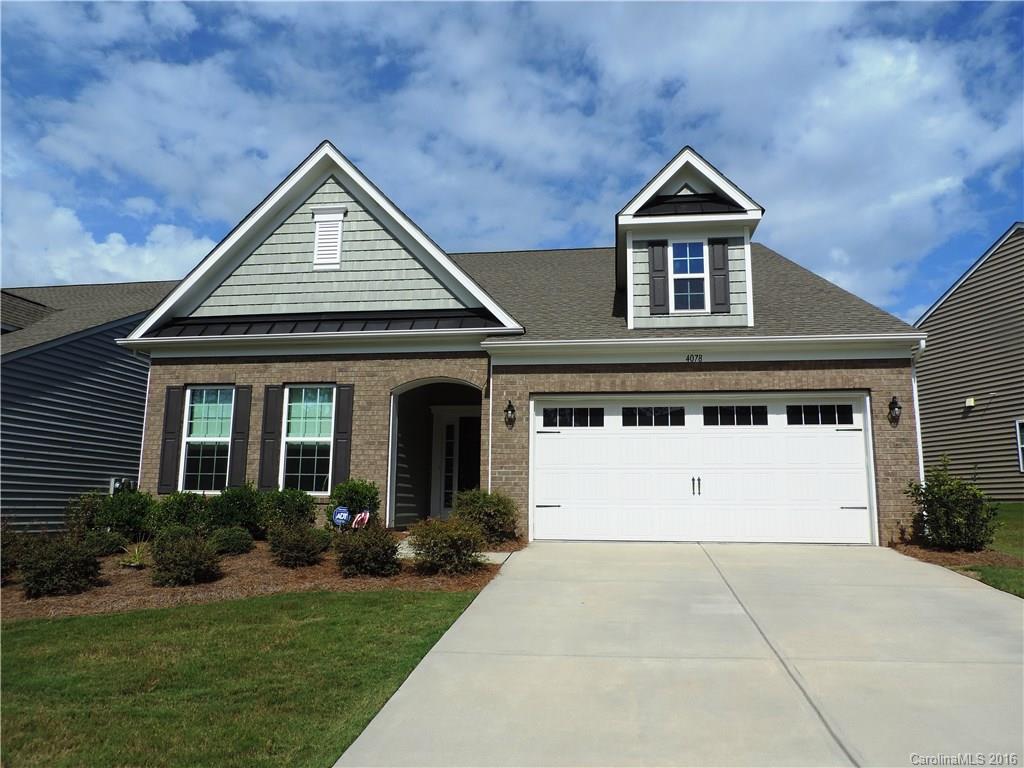 Beautiful and Immaculate home!Open Floor plan w/extra sq ft added to the Great Rm & Breakfast area.Designer Kitchen boast of Upgraded SS appliances, gas cooktop, granite countertop, and tile backsplash.Private Screened porch leads to the extended Custom Paver Patio.Spacious Mstr Suite has a sitting area, large shower w/bench, raised vanity and a nice size walk in.Professional Landscaping provide extra privacy from neighbors.Drip line for all plants & flowers.Lawn maintenance included w/HOA fee.
