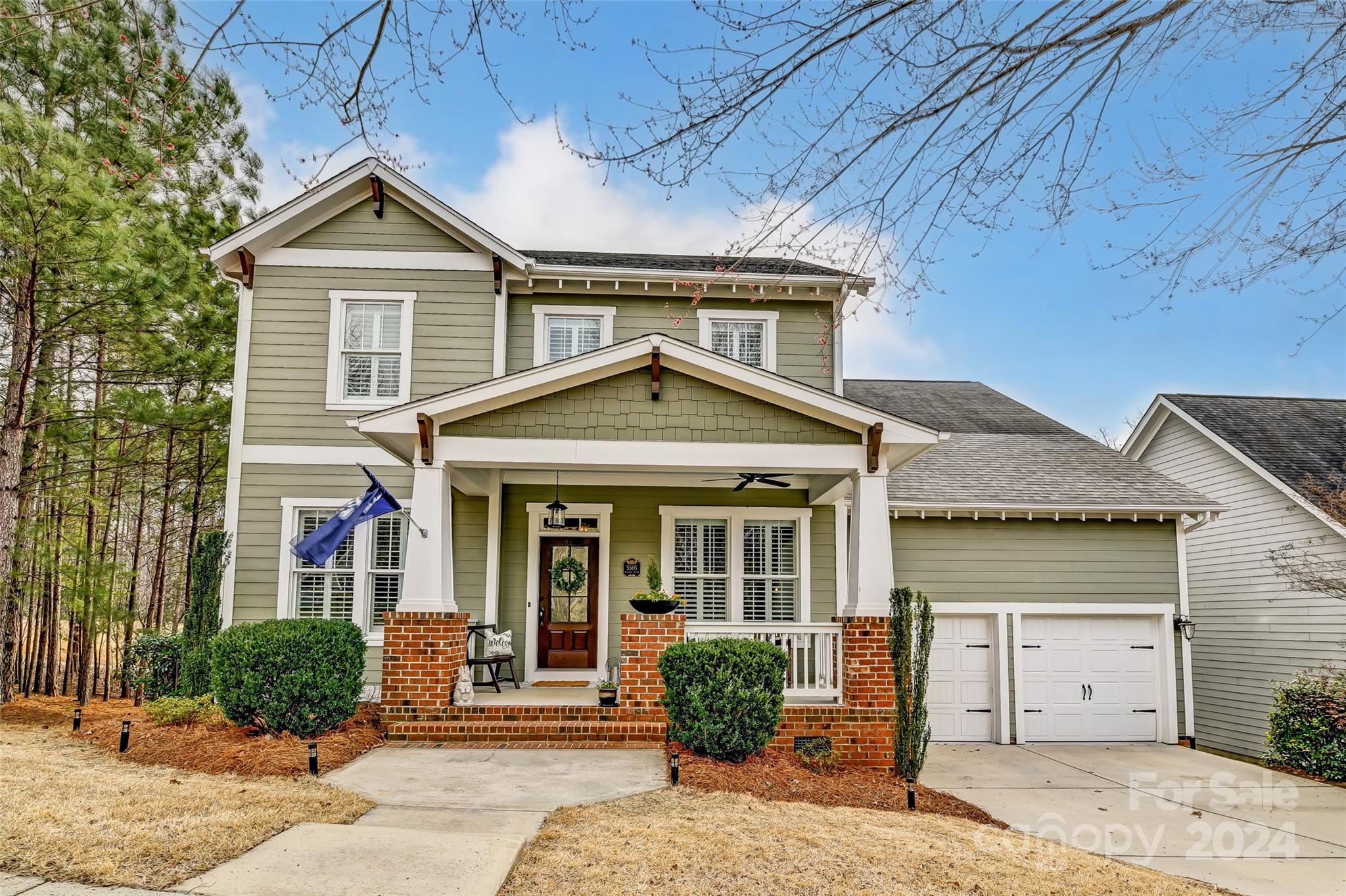 Classic Craftsman Beauty in Baxter Village! With 3,566 square feet, this home offers ample room with 5 bedrooms, 3.5 baths, and a spacious loft. Step in from the welcoming front porch and inside to gleaming hardwood floors and a chef's kitchen equipped with a gas cooktop and upgraded appliances, perfect for culinary enthusiasts. The interior is elegantly appointed with a gorgeous stone fireplace, built-in features, the primary suite down, and plantation shutters throughout. The open-concept layout is just perfect for gathering. The screened porch offers a tranquil retreat to enjoy sunsets and serene wooded viewsI Tons of storage space, including an impressive 12ft+ crawlspace that presents opportunities for further customization. Hop on the Baxter Trail system just behind the home, which provides a scenic route to the picturesque Catawba River. This Classic Craftsman home offers a blend of elegance, comfort, and convenience, making it the perfect place to call home in Baxter Village!