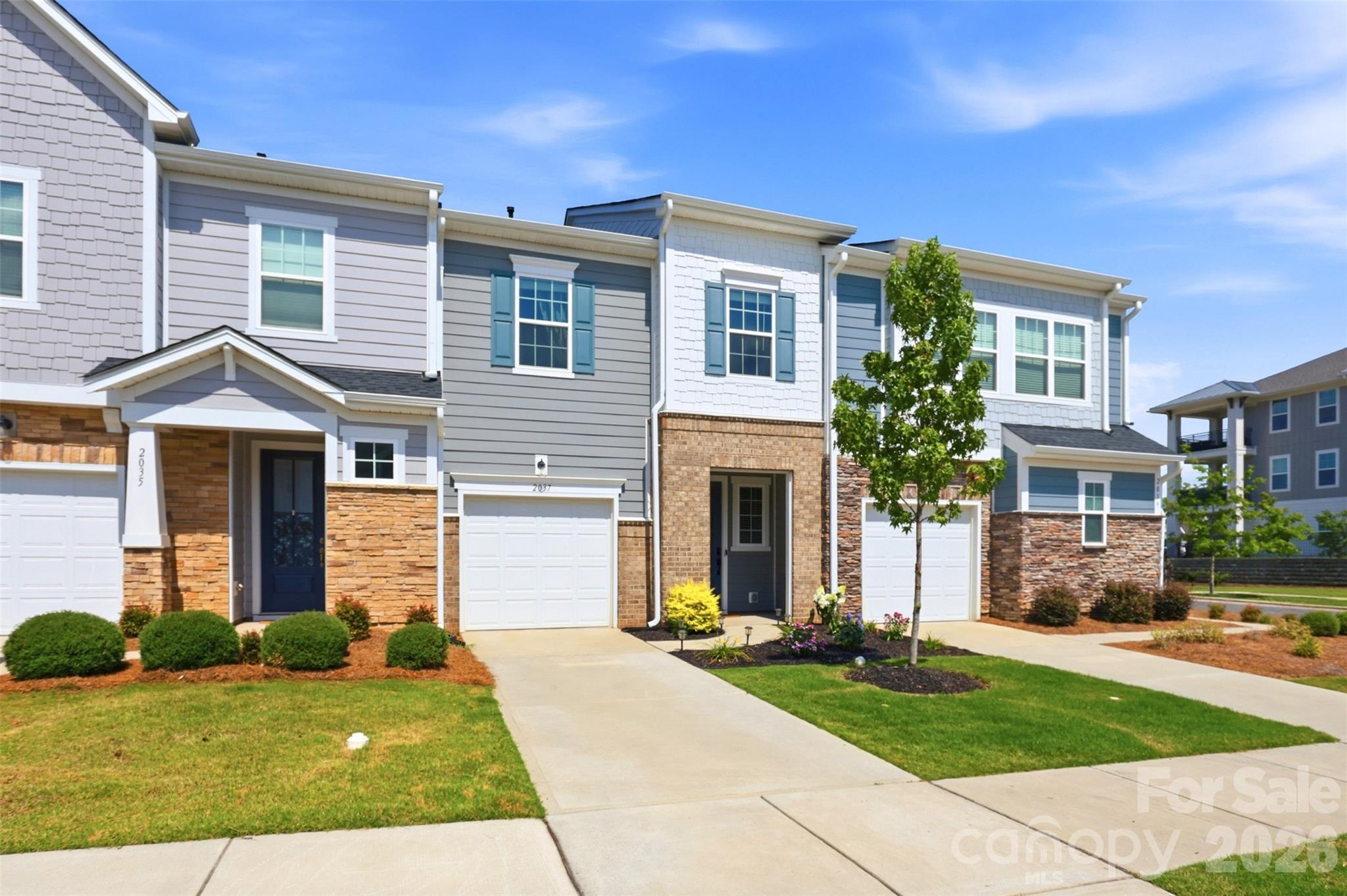 Welcome to 2037 Howell Creek Way, a 2023-built home in Charlotte, NC that stands apart with an extensive list of thoughtful upgrades throughout. Bright, open-concept, and move-in ready, this 3-bedroom, 2.5-bath home was designed for both everyday living and effortless entertaining.
At the heart of the home is an elevated kitchen package featuring granite countertops, upgraded cabinetry and hardware, a gas range, premium appliances, designer light fixtures, and an upgraded sink. The main level showcases custom wainscoting in the living and dining rooms, a striking entry accent wall with drop-zone shelving and hooks, front door privacy glass, and a stylish powder bath. Blinds and ceiling fans throughout add comfort from day one.
Upstairs, the primary suite offers upgraded lighting, custom cabinets and drawers, and a spa-inspired shower with built-in seat. A dedicated office features a designer accent wall, while the guest bath and laundry room round things out with upgraded flooring, hardware, and cabinetry. Outside, enjoy an extended patio with fresh landscaping, an epoxy garage floor, and a larger cement slab in the backyard.
The location is just as impressive. Enjoy exceptional walkability to restaurants, shopping, and everyday conveniences, with the same acclaimed developer behind Birkdale Village creating a vibrant, comparable destination right here — plus walking trails that are actively being expanded. You're just a 20-minute drive to Uptown Charlotte, 10 minutes to Concord Mills, and 10 minutes to Reedy Creek Nature Preserve.
A rare opportunity to own one of the most upgraded homes in the neighborhood!