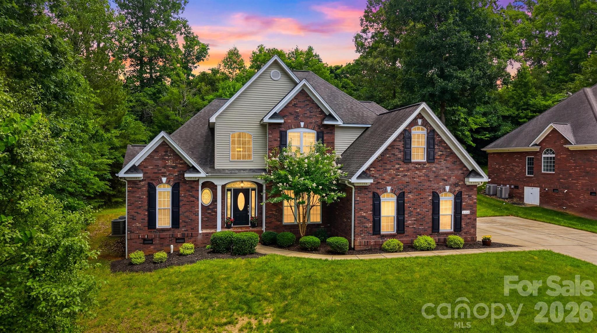 Location, location, location! Just two minutes from I-40,  and 2 minutes to Hwy 16... this move-in-ready full brick home offers approximately 2,634 square feet of updated living space with easy access to Hickory, Newton, Statesville, Taylorsville, and Charlotte Douglas International Airport. This move-in-ready brick home offers tons of beautiful windows through-out the comfortable living space in one of the most convenient locations in Catawba County. Inside, you’ll find fresh paint throughout, brand-new carpeting, beautiful hardwood floors, and granite countertops in both the kitchen and bathrooms. The versatile floor plan offers 3 bedrooms plus flexible bonus space that could easily function as a 4th bedroom, home office, exercise room, or playroom to fit your lifestyle.   The office on the main level fits right in with all those working from home and the formal dinning room is there for entertaining or the breakfast area for family morning breakfast. The spacious primary suite features a walk-in closet and large primary bath.  While additional storage can be found throughout the home, an oversized two-car garage provides ample space for vehicles, tools, hobbies, and extra storage. Combining timeless brick construction, thoughtful updates, flexible living space, and an unbeatable location, this home is ready for its next owner. Don’t miss your opportunity to make 1110 Mayfield Circle your new address.