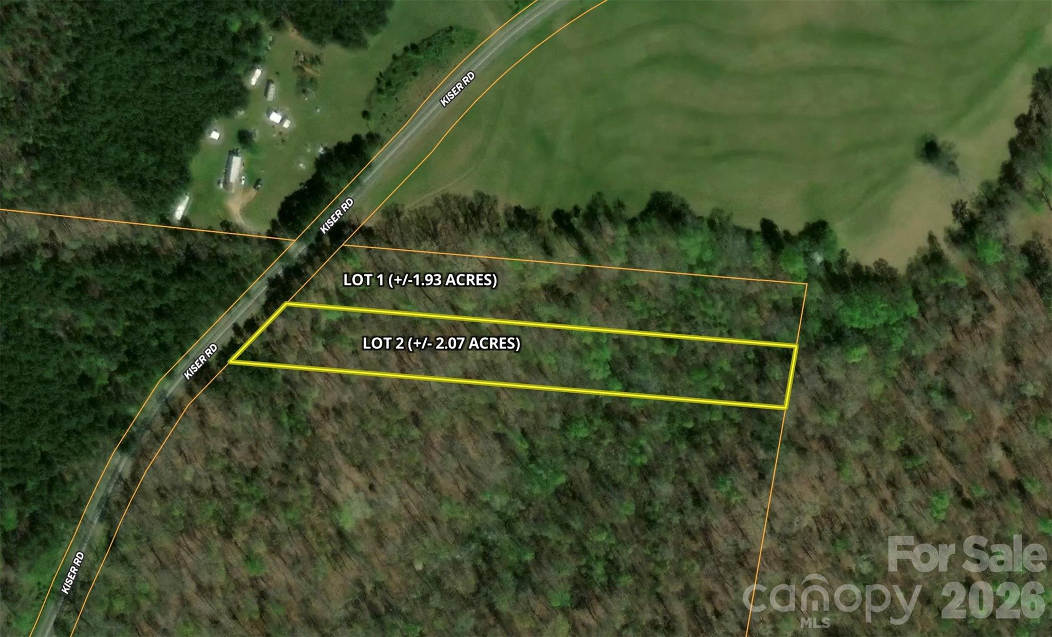 Located on Kiser Road in Bostic, NC, this ±2.07 acre tract offers a great opportunity for a homesite, weekend getaway, or investment property in Rutherford County. The property features a gently sloping topography and is mostly wooded, providing privacy and flexibility for future development.
A creek runs along the rear property line, and bridge access across the creek allows for easy access to the back portion of the tract. An existing roadbed/trail is already in place, making it easy to navigate and explore the property.
County water is available and the tap fee is included in the sale, offering added value and convenience for future construction. The property is subject to minimal restrictions, allowing buyers the freedom to create a property that fits their needs. 
An additional ±1.93-acre tract (Lot 1) adjoining the property is also available for purchase, providing an opportunity to expand your acreage and create a larger homesite or investment property.

Conveniently located in a quiet rural setting while remaining within easy reach of Rutherford County amenities, this tract offers a combination of accessibility, privacy, and usability. Whether you're looking to build, invest, or enjoy recreational use, this property is worth a look.