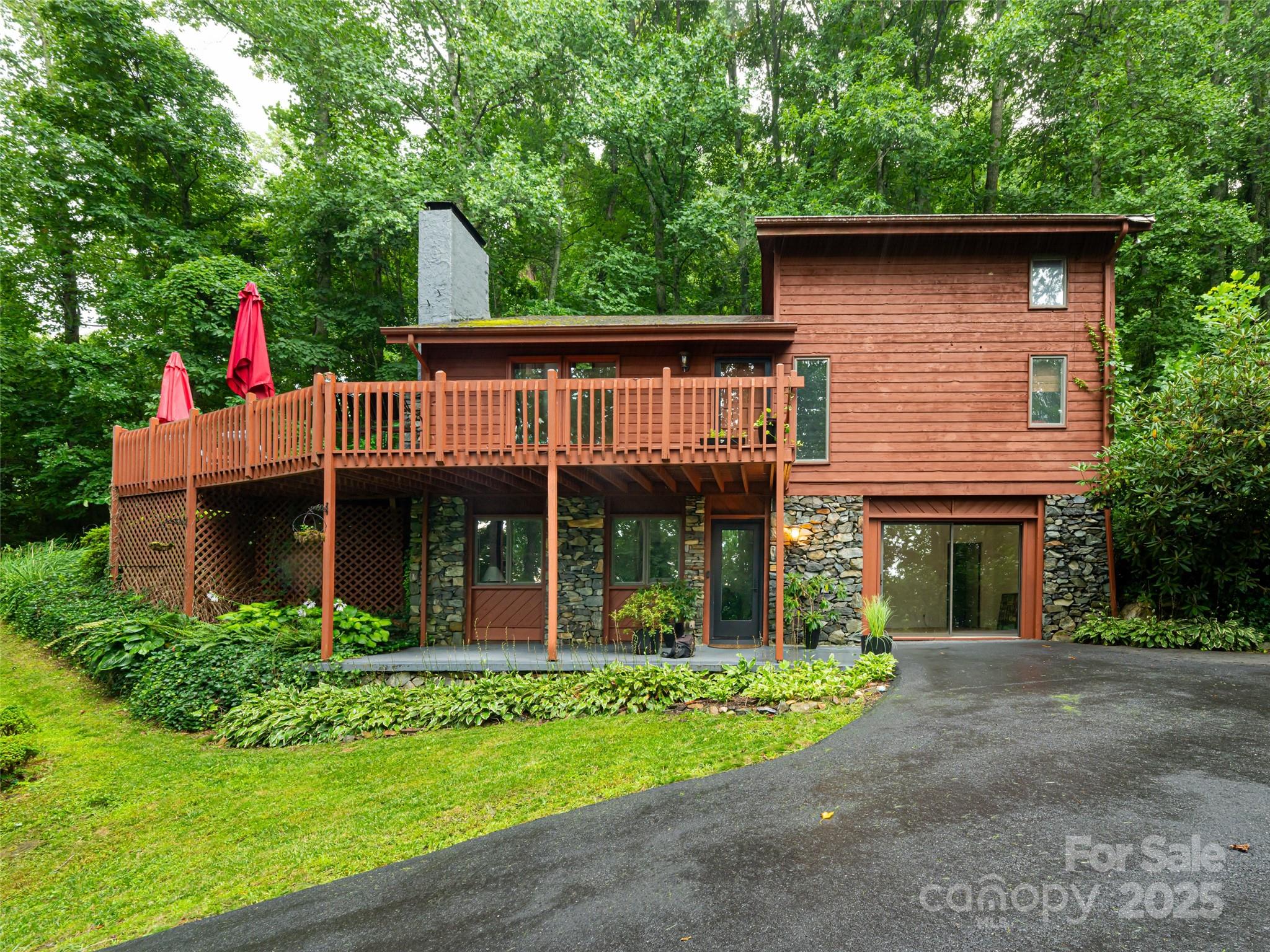 Welcome to your dream retreat, nestled on a 2.81-acre lot where tranquility meets elegance. This enchanting home features 3 spacious bedrooms and 3 bathrooms, offering the perfect blend of comfort and style. Step outside to a beautifully landscaped oasis with a serene natural spring head that is piped into the home! The highlight is the wrap-around deck, providing breathtaking winter mountain views. Privacy is paramount, with the property adjoining the expansive 29.31-acre Collier Cove Nature Preserve. This home is a rare gem where the splendor of nature and modern comforts converge seamlessly.