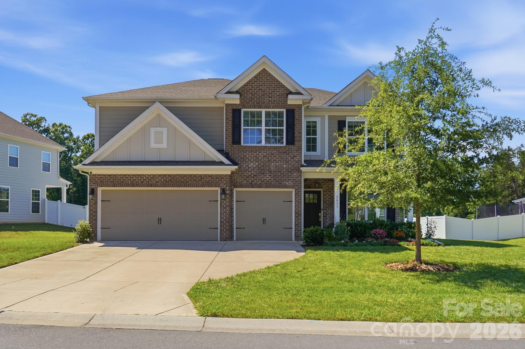 One of the most desirable offerings in Cypress Point, this beautifully maintained one-owner Graymount plan is ideally situated on a quiet cul-de-sac street with a wide homesite, no homes directly behind, seasonal Lake Wylie views, and expansive sightlines creating a uniquely open and private setting. Combined with a 3-car garage, freshly painted interior walls in a neutral palette, and thoughtful upgrades throughout, this home offers an exceptional lifestyle in one of Lake Wylie's premier communities.
Smartly designed for everyday living and entertaining, the main level features a private study with 15-light French doors, formal dining room, built-in drop zone by the garage door, guest bedroom, and full bath. The well-appointed kitchen opens naturally to the living area and is enhanced by granite countertops, a large island, gas range, deep pantry and an upgraded KitchenAid double oven with steamer. With a gas fireplace for instant ambiance and warmth, French door to the back patio, an abundance of natural light and plenty of space to gather, family and friends will feel comfortable and inspired on the main floor. 
Upstairs, the spacious primary suite creates a peaceful owner's haven overlooking the backyard and beyond, and features a sitting room, twin walk-in closets, and a spa-inspired bathroom with dual vanities and a floor-to-ceiling tiled shower highlighted by glass doors and a transom window to welcome the morning sunshine. One of the secondary bedrooms includes its own en suite bath, while the oversized loft/rec room offers exceptional flexibility for movie nights, gaming, fitness, hobbies, or additional living space. The convenient upstairs laundry room includes a Maytag washer and dryer.   
Step outside to enjoy the private backyard and patio, where the absence of rear neighbors creates a peaceful backdrop for relaxing, entertaining, gardening, or play. The smart WiFi-enabled irrigation system automatically adjusts for rainfall and helps maintain blackberry bushes, strawberries, carrots, rosemary, echinacea, and zinnia flowers. The backyard playset provides a ready-made space for outdoor fun and can remain for the next owners, or removed at request.
Additional features include an EV charger in the 3-car garage, Nest smart thermostats, Nest exterior security cameras, Yale smart locks, Google Home integration, Cat6 fiber wiring supporting high-speed service from both AT&T Fiber and Comporium, a large fireproof safe, and many other tech upgrades/conveniences. Simply unpack and enjoy, this property is truly turnkey ready. 
Located within the award-winning Clover School District and convenient to Lake Wylie dining, shopping, recreation, and waterfront enjoyment, this impressive home combines privacy, technology, flexibility, and modern comfort in a setting rarely found in today's market.