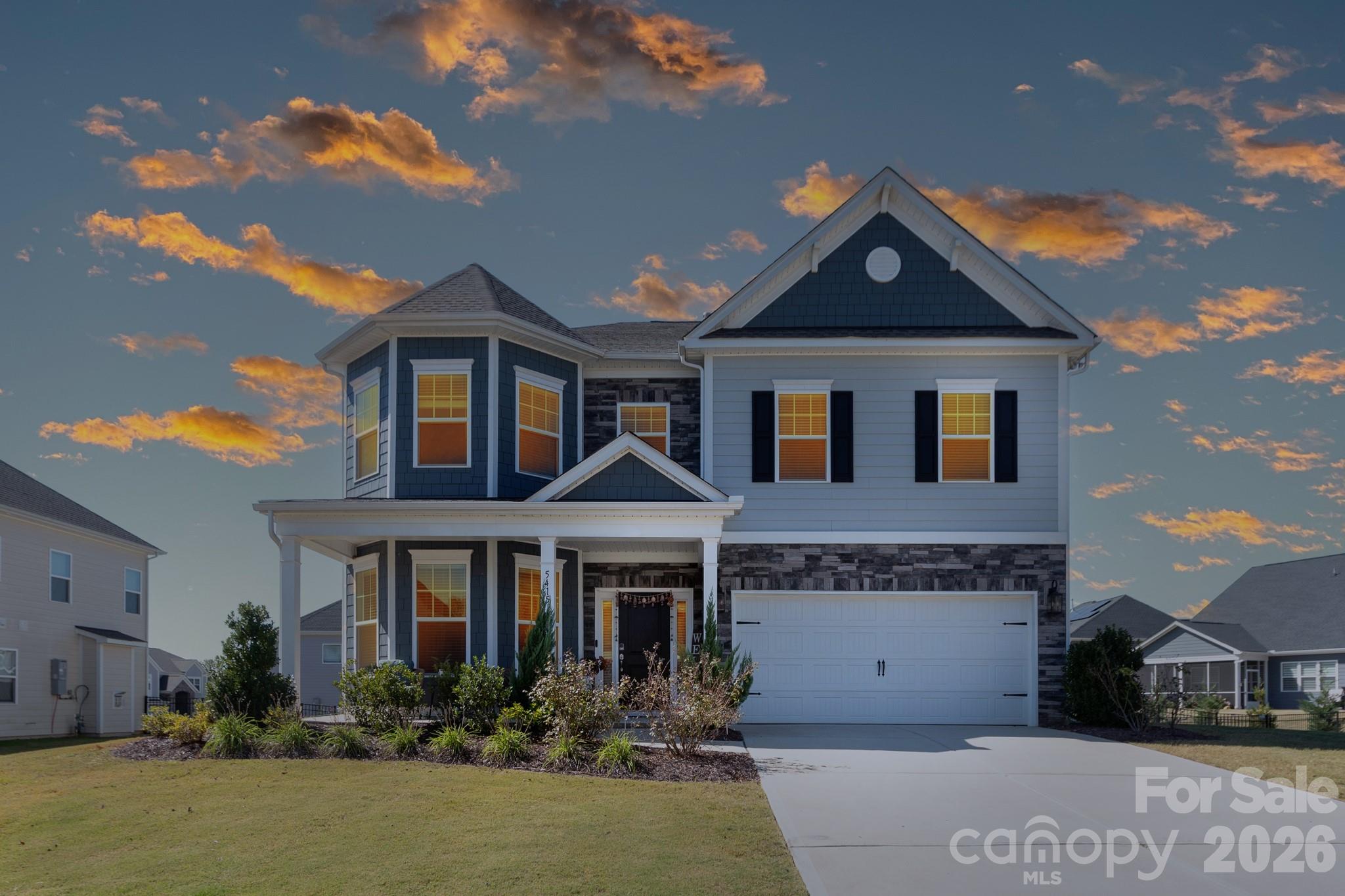 Enjoy spacious, like-new living in this well-maintained home in popular Covington! Located in a great South Carolina location with Indian Land schools, and just 10 minutes from all that Ballantyne has to offer (including The Bowl!). Lovely curb appeal greets you with fiber cement siding, stone accents, and a welcoming front porch. Inside, you'll find a dedicated office with French doors, plus a main-level bedroom and full bath. The upgraded kitchen features a five-burner gas cooktop, vent hood, double ovens, quartz countertops, and a stylish herringbone backsplash. A butler’s pantry (and walk-in pantry) connects the kitchen to the dining room with wainscoting. The light-filled living room is situated at the back of the home and centers around a gas-log fireplace. Upstairs, the expansive primary suite impresses with a tray ceiling, spa-like bath with dual vanities, soaking tub and separate shower, and a large walk-in closet. Two additional bedrooms, a shared bath, laundry room, and a spacious loft/bonus area (perfect as a playroom or media space) complete the upper level. Additional highlights include a tankless water heater, a two-car garage, back patio and fully fenced backyard. Covington residents enjoy a clubhouse, community pool, and sidewalks for easy neighborhood strolls. Welcome home!