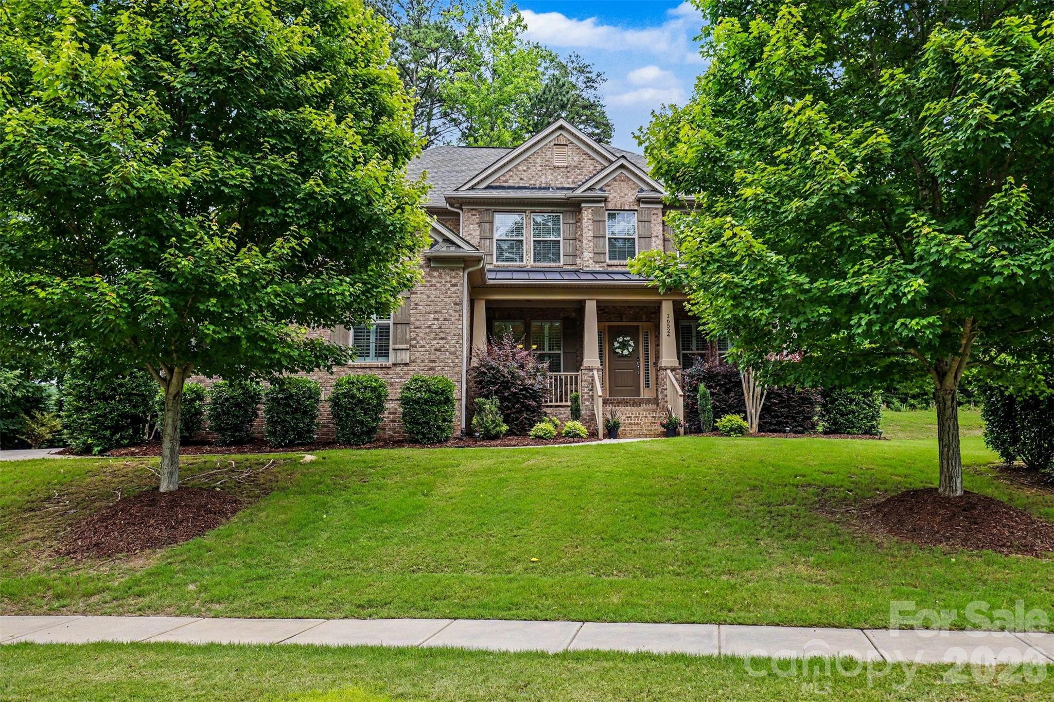 Experience luxury living in the highly sought-after Crosshaven section of The Palisades. Situated on a premium golf course lot overlooking the 3rd hole of Palisades Country Club, this beautifully crafted home offers seasonal views of Lake Wylie, mature trees, and access to miles of scenic walking trails throughout the community. Tucked away on a quiet, low-traffic street that ends in a cul-de-sac, the setting provides a peaceful backdrop within this established neighborhood.
Step inside to discover gleaming hardwood floors throughout the main living areas, an office, formal dining room, and a main-level guest suite. The open-concept great room is anchored by a stunning floor-to-ceiling stacked stone gas fireplace and flows seamlessly into the gourmet kitchen, featuring granite countertops, abundant cabinetry, a gas cooktop, and double wall ovens. Just beyond the kitchen, the bright and inviting sunroom provides the perfect space to enjoy your morning coffee while taking in the golf course views.
Upstairs, you'll find the luxurious primary suite, two additional bedrooms, and a spacious flex room offering endless flexibility for a media room, playroom, or home gym. The primary retreat features a generously sized bedroom, dual vanities, a soaking tub, a glass-enclosed tiled shower, and an expansive walk-in closet.
Outside, enjoy a beautifully landscaped homesite complete with an irrigation system and picturesque golf course views. The attached three-car garage features soaring ceilings, providing exceptional storage potential and ample space for vehicles.
Residents of The Palisades enjoy exceptional amenities, including a resort-style pool, clubhouse, fitness center, pickleball and tennis courts, playgrounds, recreation areas, and much more. All conveniently located just minutes from Lake Wylie, shopping, dining, and Charlotte Douglas International Airport.
