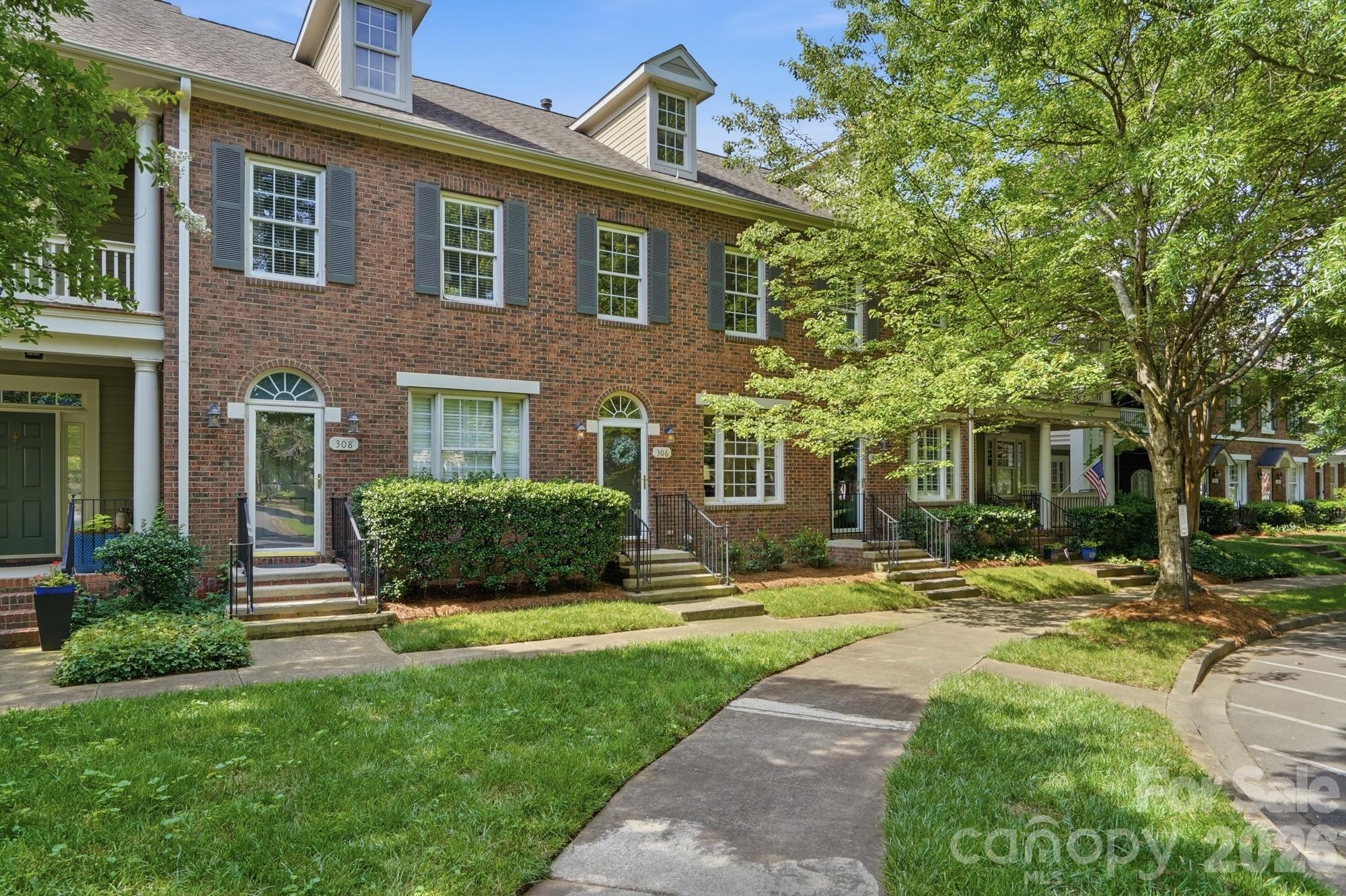 Welcome to Baxter Village, where the lifestyle is just as appealing as the home itself. This beautifully maintained 2-bedroom, 2.5-bath townhome offers 1,220 square feet of thoughtfully designed living space in one of Fort Mill's most sought-after communities. Located across from a large community green space and just a steps to one of the two pools, you'll love being in the heart of everything Baxter has to offer. Spend evenings enjoying concerts and community events on the Community Green, meet friends for dinner in Baxter Town Center, or take advantage of the walkability to local restaurants, coffee shops, fitness studios, shopping, and the Fort Mill Library. Inside, the home is move-in ready with hardwood floors throughout the main living areas and an updated kitchen featuring tile flooring. The private courtyard provides the perfect place to unwind, while the dedicated parking space adds everyday convenience. Low-maintenance living provides more time to enjoy the vibrant Baxter lifestyle that makes this community one of Fort Mill's most desirable places to call home. Fantastic location just minutes to downtown Fort Mill, I-77l and all that Uptown Charlotte has to offer!