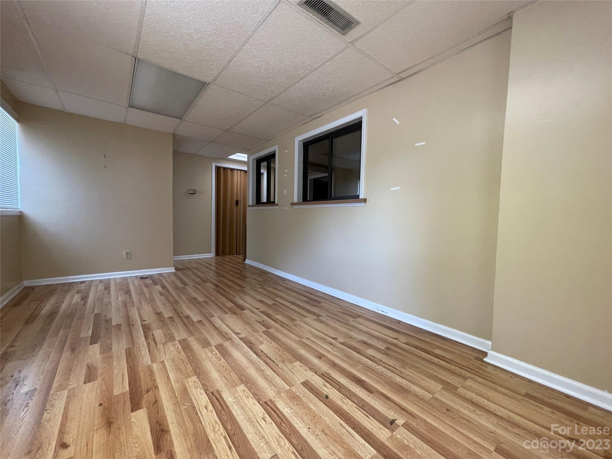 Great commercial space available in uptown Wadesboro. It is located in the lower/basement portion of the building (below Anson Family Dentistry). It currently has a waiting/reception area, four offices/rooms, and a kitchenette/break room area. It was previously used for a medical office, but it has a number of possibilities. Contact Plank Road Realty to schedule a showing.
