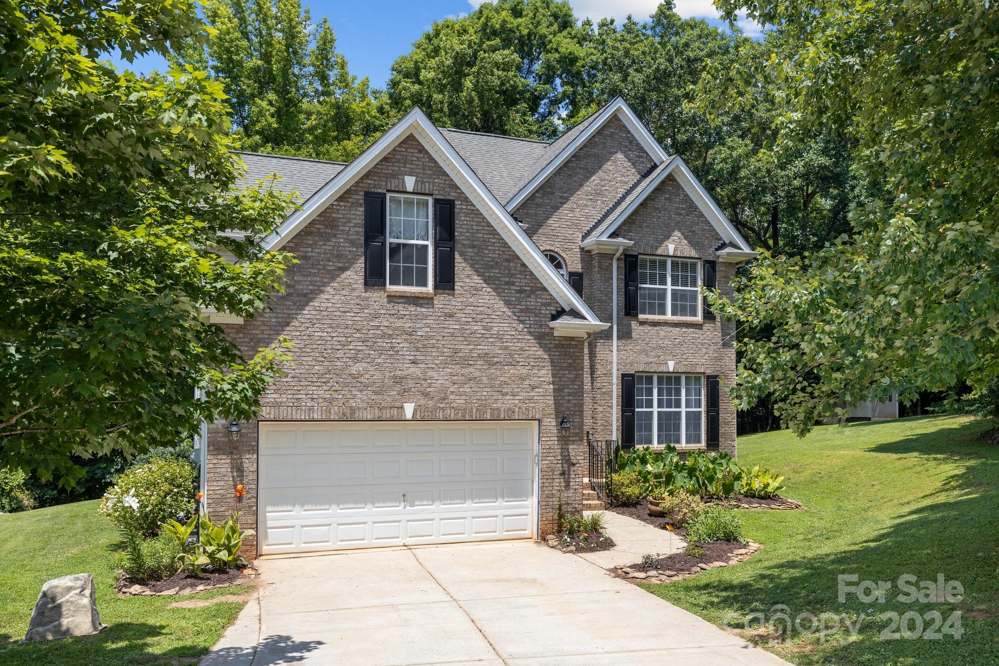 Welcome to your hard-to-find dream home, nestled on a serene cul-de-sac in Lynnwood Farms with over 1 acre of land! This gem is a rare find- the sellers' relocation is your golden opportunity! Priced to sell, this stunning 4-bedroom residence, with an extra bonus/bedroom, features 2.5 baths and a grand two-story entry and living room with a cozy gas fireplace. The formal dining room and butler's pantry make entertaining elegant and seamless. The eat-in kitchen opens onto a composite deck overlooking your private backyard. The primary bedroom, conveniently on the main floor, boasts a luxurious ensuite bath with a separate tub and shower. Upstairs, find three additional bedrooms and a bonus/bedroom. Enjoy lush, tree-lined privacy, a tankless water heater, irrigation system, and electric fence. Plus, new garage door can be controlled via smartphone. Located in award-winning Fort Mill school district, this peaceful retreat offers both luxury and tranquility, close to shopping and dining.