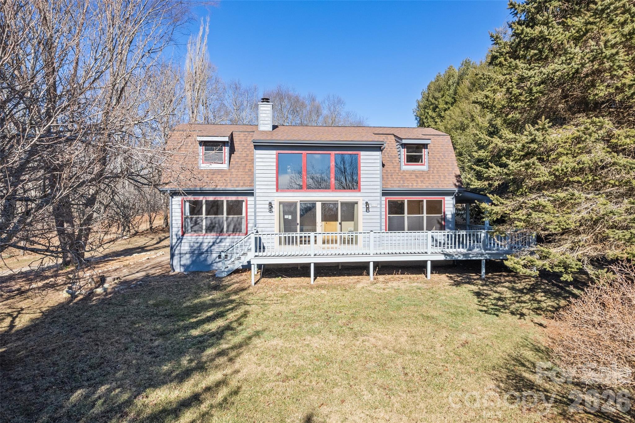 Mountain top getaway perched above 4,000 feet, offering cool breezes and a true sense of retreat. The home enjoys a peaceful setting with wintertime mountain views that open up the surrounding landscape. Relax on the spacious porch, perfect for morning coffee or evenings under the stars. Inside, a wood burning fireplace anchors the living space, creating a warm and inviting mountain ambiance. Nestled on approximately one acre, the property includes an outbuilding with electric, ideal for a workshop, studio, or hobby space. Bordering Canton’s Rough Creek Watershed, the property is enhanced by a serene natural backdrop. Fruit trees and grapevines add to the charm of this peaceful, high-elevation setting. Whether as a full-time residence or mountain escape, this property offers character, and timeless mountain living.