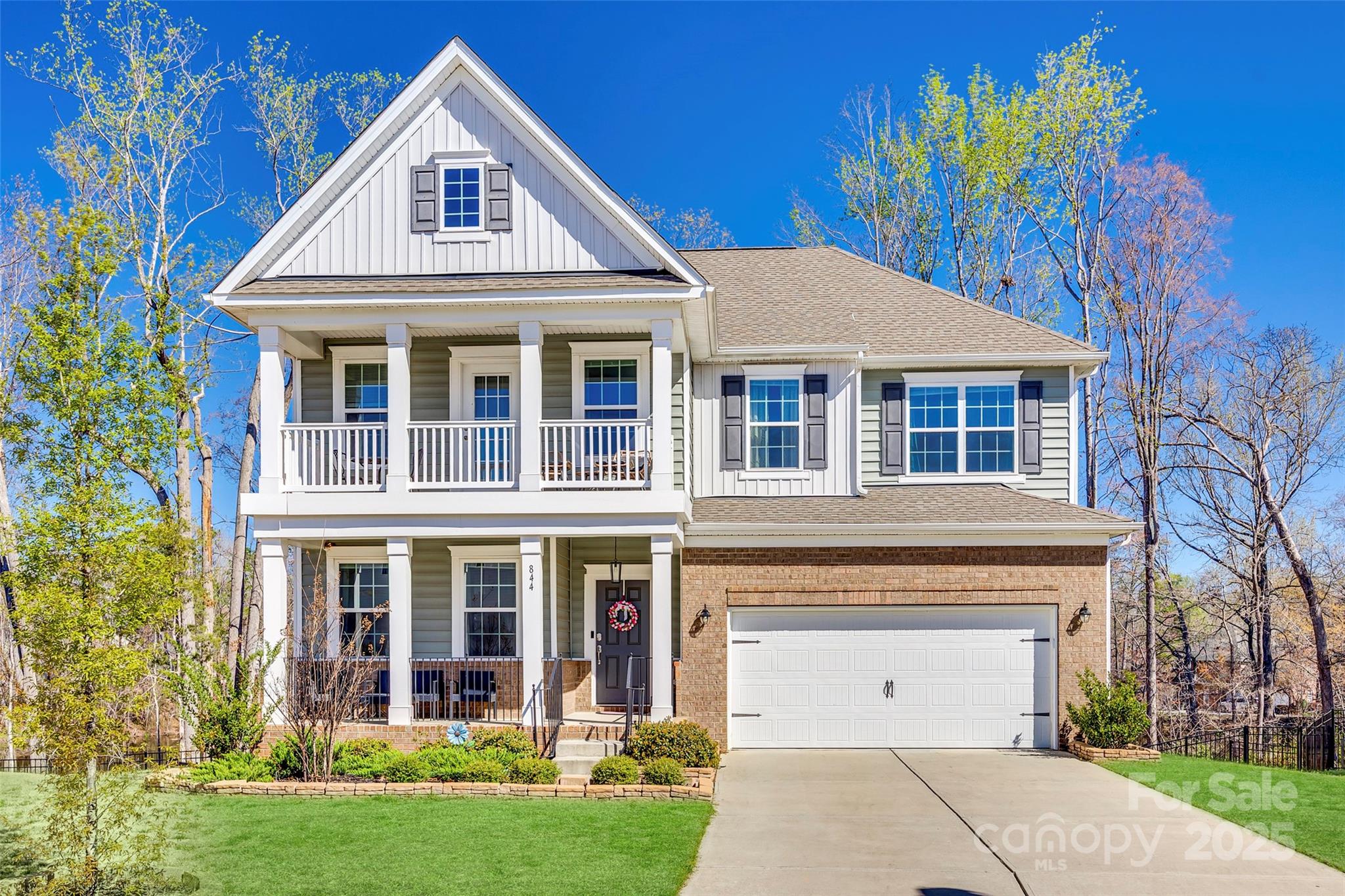 Rare 5R, 5BA gem located in the highly sought-after Fort Mill School District offers an exceptional living experience. Open-concept main floor features kitchen with quartz countertops, stainless steel appliances, and large island perfect for entertaining flowing to a spacious deck overlooking the backyard with breathtaking pond views. You will also find a cozy living and dining area, bedroom with full bath, and versatile den/office. Upstairs, the oversized master suite is a true retreat, complete with a spacious bathroom and an expansive walk-in closet. Three additional bedrooms, two full baths, and dedicated laundry complete the second floor. Newly finished walk-out basement is an entertainer’s dream, with a second full kitchen, full bath, and French doors opening to the backyard with direct access to the tranquil pond. Enjoy a garden bed, under deck storage, and a peaceful setting just steps from your door. Don't miss this rare chance to combine luxury, convenience, and nature!
