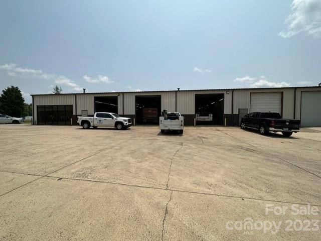 The property was built in 1993 and renovated in 2000. Ceiling Height 14'-16' with heavy steel frame construction with metal and partial front brick facade exterior. The building has 2,000 sqft of office space, with 6 offices, a conference room, a printing room, multiple restrooms, a kitchen, dropped ceiling with acoustical tile and vinyl plank tile. The warehouse area is 17,030 sqft with metal roofing, multiple drive-in doors, a dock-height door, two cranes, multiple suspended gas heaters as well as multiple forced air ventilation.