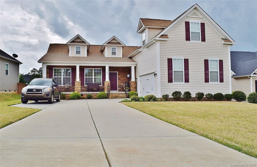 Call this lovely home in up and coming Heritage Hall yours today! Desirable open floor plan with split bedrooms and master on the main floor as well as massive bonus room/guest suite upstairs. Curl up with a book in the cozy sunroom or frolic in the fenced backyard with sizable storage building. Home projects are easy to achieve in the ultra-deep garage with workshop area. Why wait to build when you can buy and move in now? This house is so you!