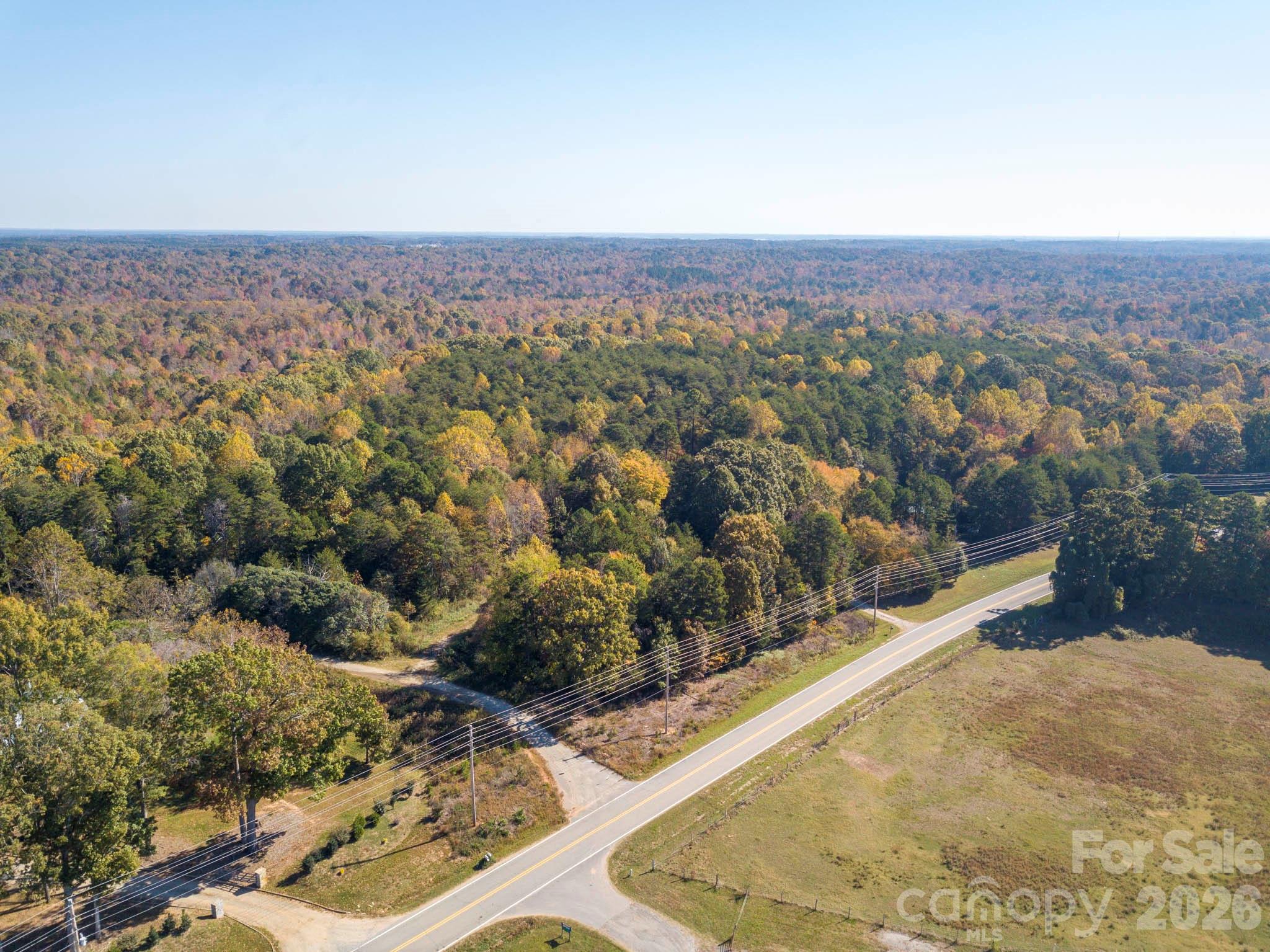 Do you dream of building a home or family compound with plenty of space for privacy, common areas, walking or atv trails? Or maybe your goal is to develop a neighborhood offering a prime location to access beautiful parks and nature preserves, activities on the lake, or golfing? If so, this is your chance to secure 50 wooded acres of land that is located within 15 minutes of Lake Norman. Two parcels and a deeded easement are being combined to offer a buyer/investor the chance to be a part of one of North Carolina’s most desired markets, where their creativity can shine. Bring your plans and experience the peacefulness in person. Schedule a site visit today!