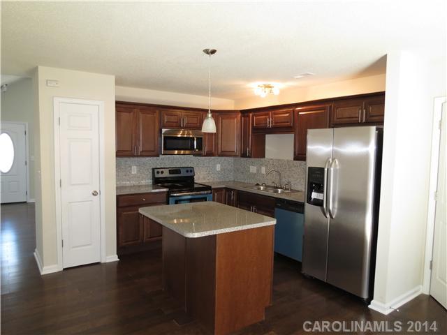 Clean & move in ready.  Fresh paint.  New wood flooring and new carpet.   All kitchen appliances.  Buy with confidence. The home has been inspected by NPI and the repairs have been made.