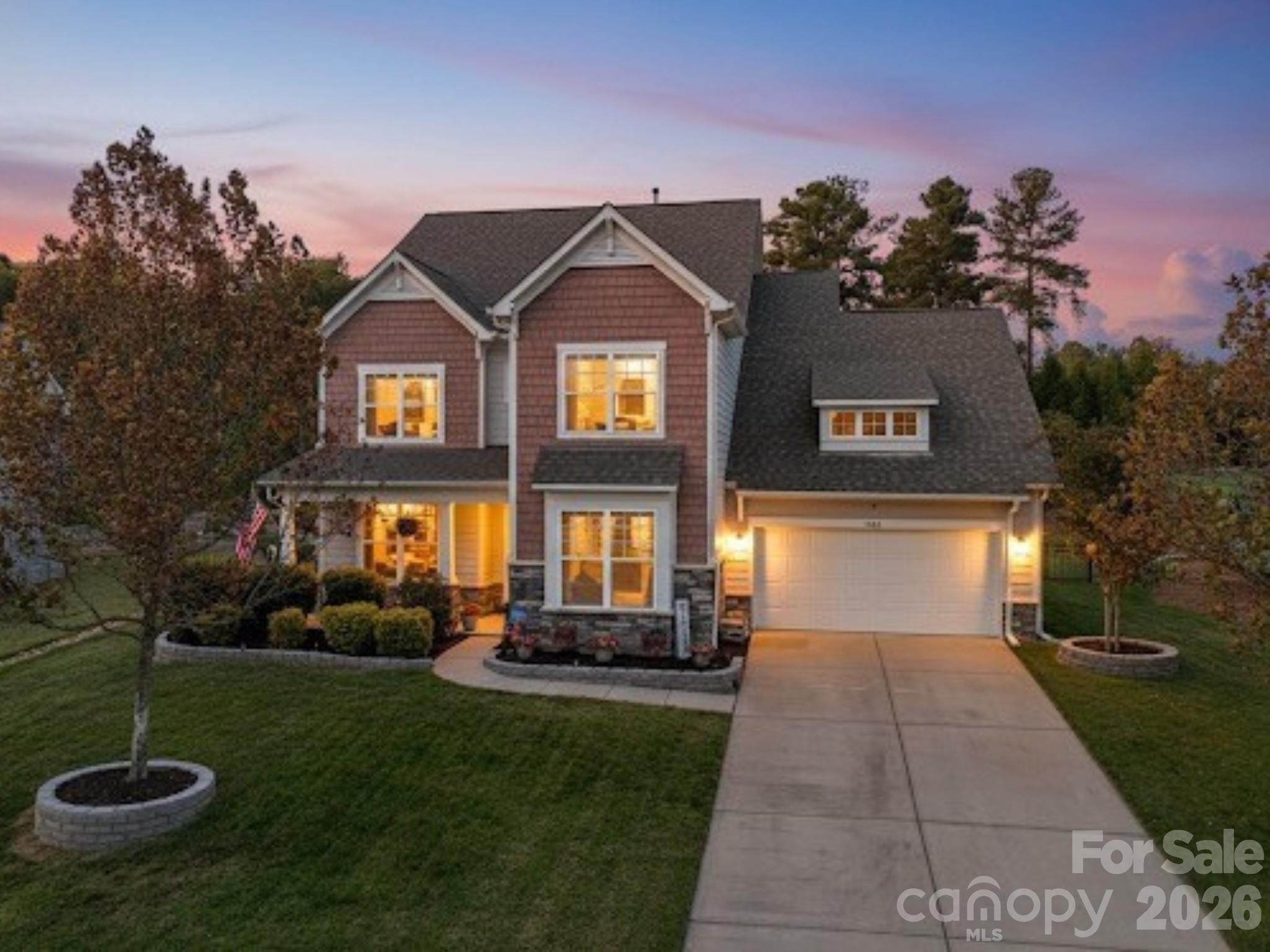 Discover elevated living in the highly desirable Bent Creek community. This stunning home offers the perfect blend of modern elegance, thoughtful design, and everyday comfort. With its open layout, luxury finishes, and abundance of natural light, every space feels warm, inviting, and beautifully crafted.

The gourmet kitchen showcases granite countertops, stainless steel appliances, wall oven & microwave, and an oversized island, flowing seamlessly into the living room with a cozy gas fireplace—ideal for relaxing or hosting. A convenient main-level guest suite and formal dining room provide flexibility for today’s lifestyle. Plus home office on main!

Upstairs, escape to the spacious primary suite complete with a spa-inspired bathroom and two large walk-in closet with custom built-ins. The upper level also features a loft, generous secondary bedrooms, and a versatile bonus room perfect for an additional bedroom, media room, home office, or fitness space.

Enjoy outdoor living year-round on the expansive covered back patio overlooking a private, fenced yard. Located on a quiet cul-de-sac, this home is just moments from Bent Creek’s resort-style amenities, including a pool, clubhouse, playgrounds, and walking trails. Conveniently located near shopping, dining, and major highways (521) for easy access to everything the Carolinas have to offer!

Sellers are prepared for their next move and are ready to welcome buyers who appreciate the value this beautiful home offers. A rare opportunity in one of the area’s most sought-after communities!
