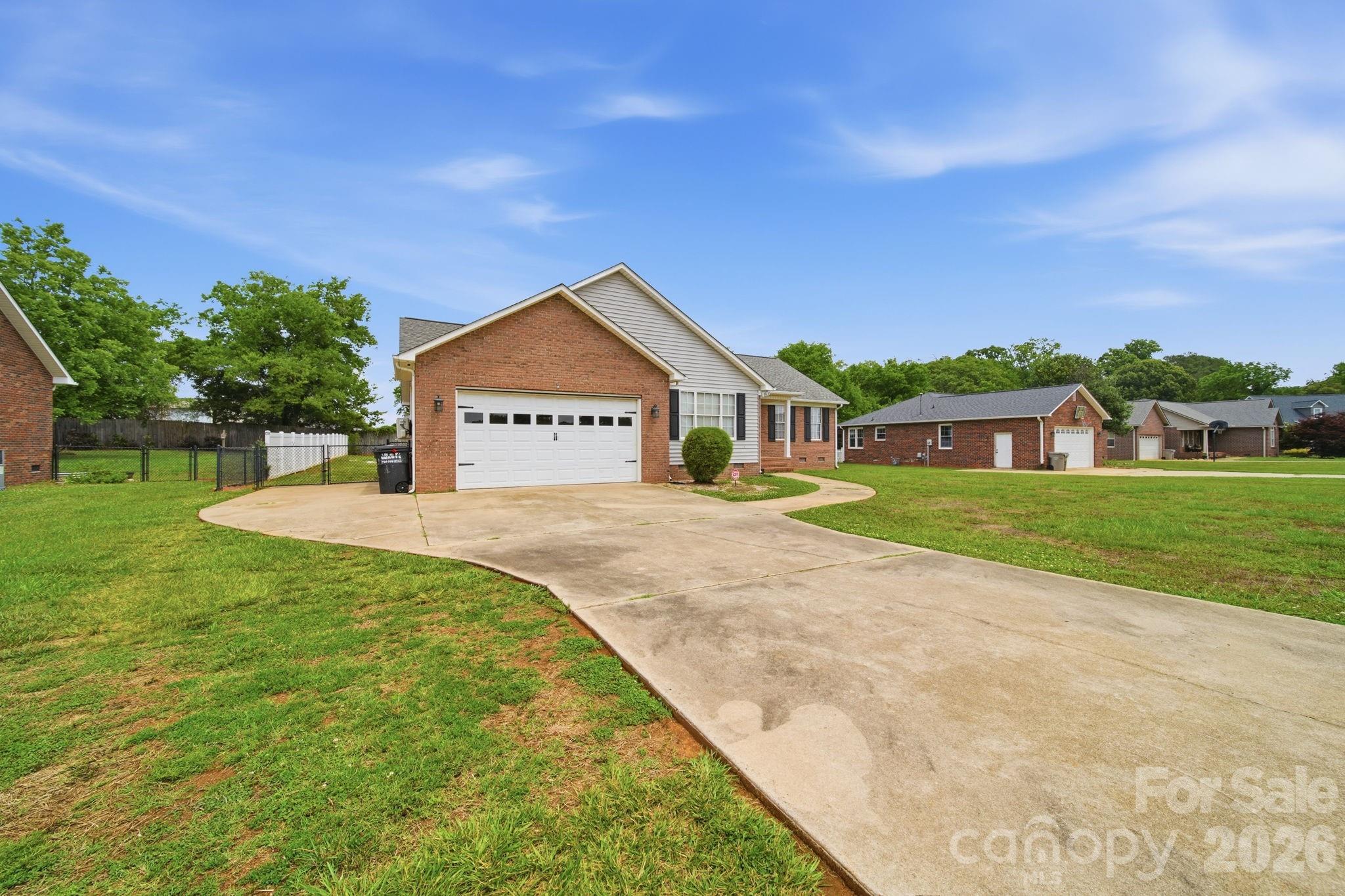 Welcome home to this charming 3 bedroom, 2 bathroom ranch nestled in a sweet community just minutes from downtown Rockwell, NC! Sitting on nearly half an acre with NO HOA, this property offers the perfect blend of comfort, space, and flexibility.
Inside, you’ll love the updated flooring and functional layout, plus added space in the back that makes a perfect bonus room, office, playroom, or second living area. The primary suite features an extended closet for extra storage and convenience.
Step outside to enjoy the fenced backyard, ideal for pets, entertaining, or relaxing evenings at home. A concrete pad already in place gives you endless possibilities for your next idea — outdoor kitchen, workshop, firepit area, or future addition.
If you’ve been searching for a move-in ready home with room to grow in a quiet, charming location close to everything Rockwell has to offer, this is one you won’t want to miss!
