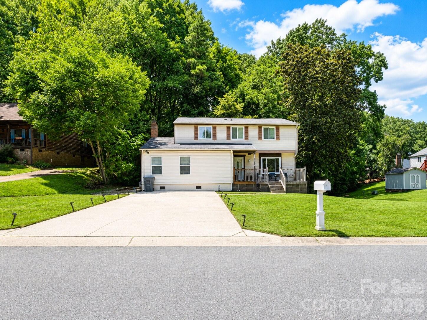 Welcome to this charming two-story home in the desirable Olde Concord community, offering five bedrooms, three-and-a-half bathrooms, and plenty of space for comfortable everyday living and entertaining. Situated on a spacious wooded lot, the property provides a peaceful setting with added privacy and beautiful natural surroundings.

A large covered front porch creates an inviting first impression and offers the perfect place to relax and enjoy the neighborhood. Inside, neutral colors throughout provide a bright, versatile backdrop that will complement a variety of decorating styles. The spacious living room flows seamlessly into the dining area, creating an open and welcoming space for hosting family and friends.

The kitchen is equipped with granite countertops, a tiled backsplash, stainless steel appliances, ample cabinetry, and a convenient breakfast bar for casual dining or additional seating. Just beyond the kitchen, the family room offers direct access to a large, newly constructed deck overlooking the wooded backyard—an ideal setting for outdoor dining, entertaining, or simply enjoying the peaceful surroundings.

The main level features a primary bedroom with a private en-suite bathroom, providing convenience and flexibility for homeowners or guests. Upstairs, the home offers additional generously sized bedrooms and bathrooms, including a spacious vanity area, a large walk-in closet, and a stand up shower.


Brand new A/C unit installed to add extra comfort and peace of mind. 


With its flexible floor plan, abundant living space, updated outdoor area, and private wooded setting, this Olde Concord home offers a wonderful combination of comfort, functionality, and charm.