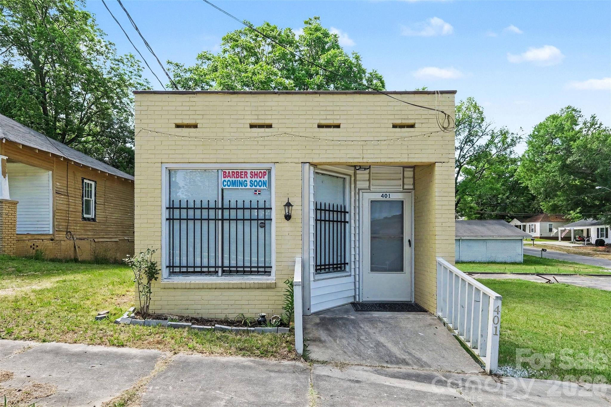 This building has been vacant for approximately one year and is ready for new ownership and fresh ideas. Perfect opportunity for business, office, retail, or investment potential in a growing area. Offers great potential for business or investment use with excellent visibility and accessibility.

The parking located next to the barbershop is included as part of the lot.