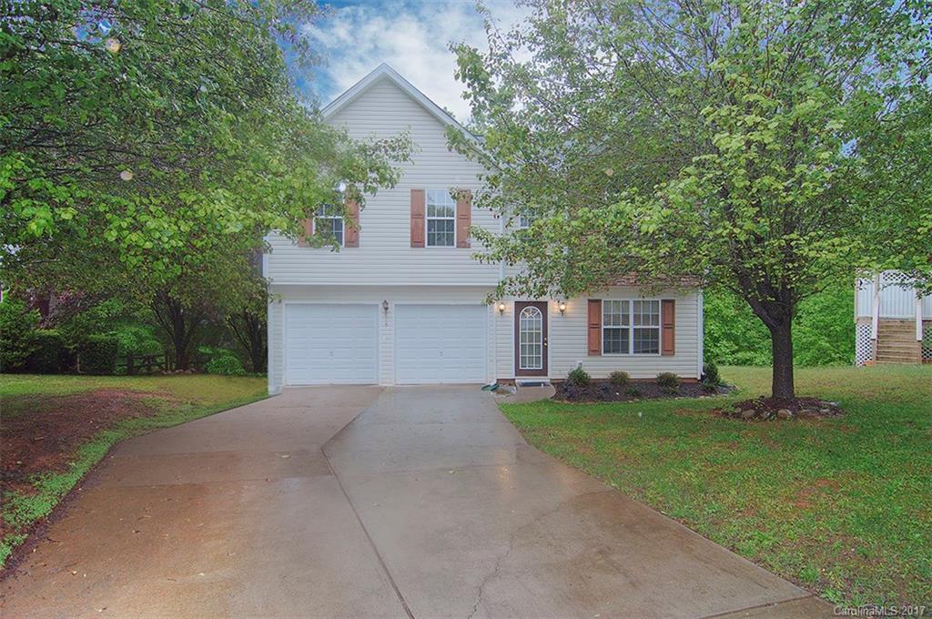 Beautiful 4 bedroom home on 1/2 acre wooded lot!  This culdesac lot overlooks hardwoods as far as the eye can see and offers lots of privacy!  Large great room with gas log fireplace, lovely dining area with chair rail molding, huge master bedroom suite with double trey ceiling, his & her closets, garden tub & separate shower.  Close to the wonderful Waxhaw amenities & historic downtown Waxhaw, yet qualifies for 100% USDA financing!