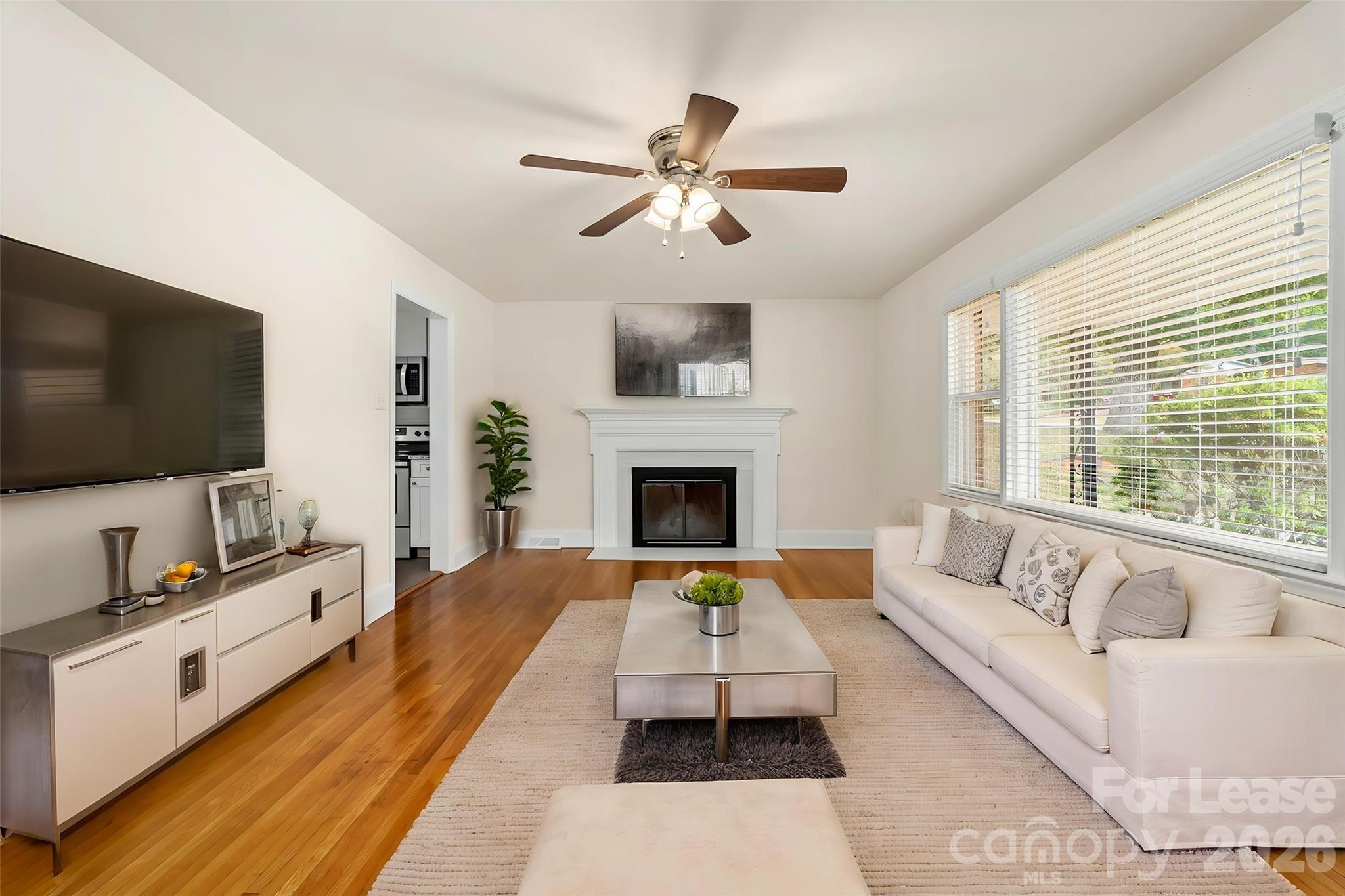 Easy commute to Uptown, SouthPark, & University! You will not be disappointed in viewing this property!! Recent upgrades include freshly painted inside, original hardwood floors in bedrooms, living room, foyer, and hallway, various new lighting, and custom 2" blinds! Although, the fireplace received a facelift two years ago to create a more contemporary vibe, it isn't usable but left for aesthetic reasons. Washer and dryer is included and located in mechanical room! House is pet friendly with minimal conditions. Call listing agent for details. Pet fee stated is per pet.****Please Note: Various Primary Bedroom, Second Bedroom, and Third Bedroom/Office, Kitchen, Livingroom pictures have been virtually staged****