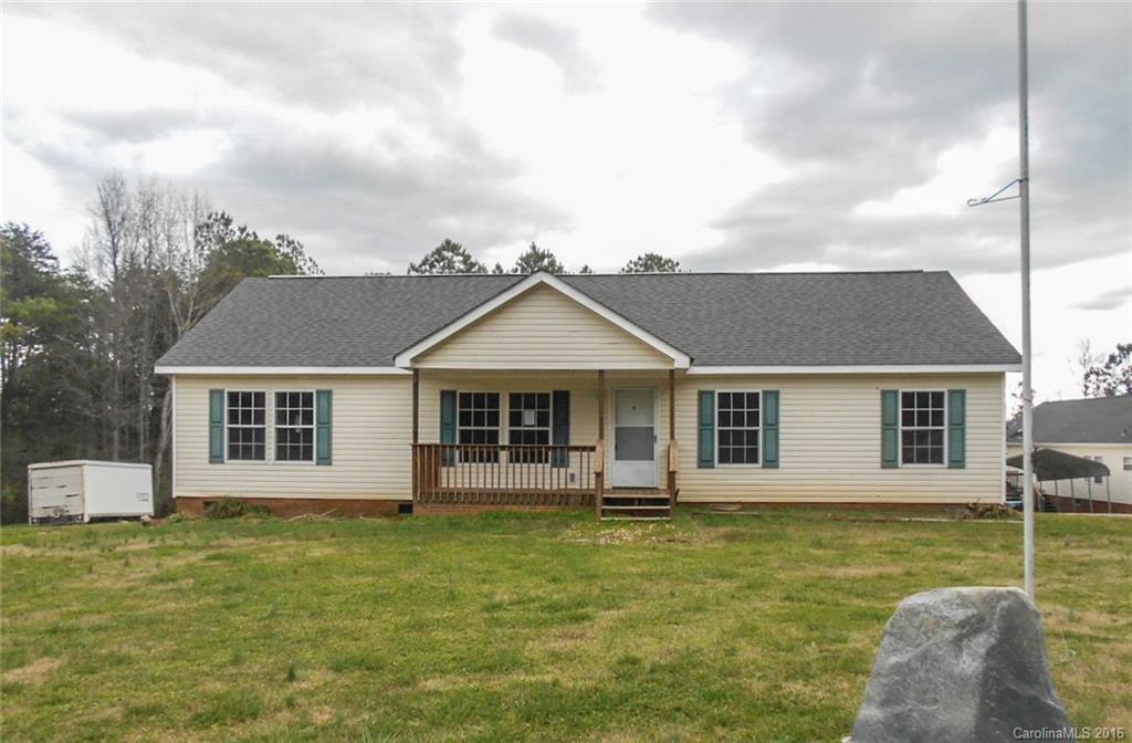 Less than 2 miles from downtown York. Bright, open floor plan. Large country kitchen with lots of cabinets and counter space. Split floor plan. master bedroom and bathroom are spacious. Master bath has two sinks.  There is a walk in closet in the master bedroom. Covered front porch and back deck.  Needs interior paint, carpet replacement and carpentry repairs. The front yard is large and level. Back yard gently sloping and backs up to a wooded area.