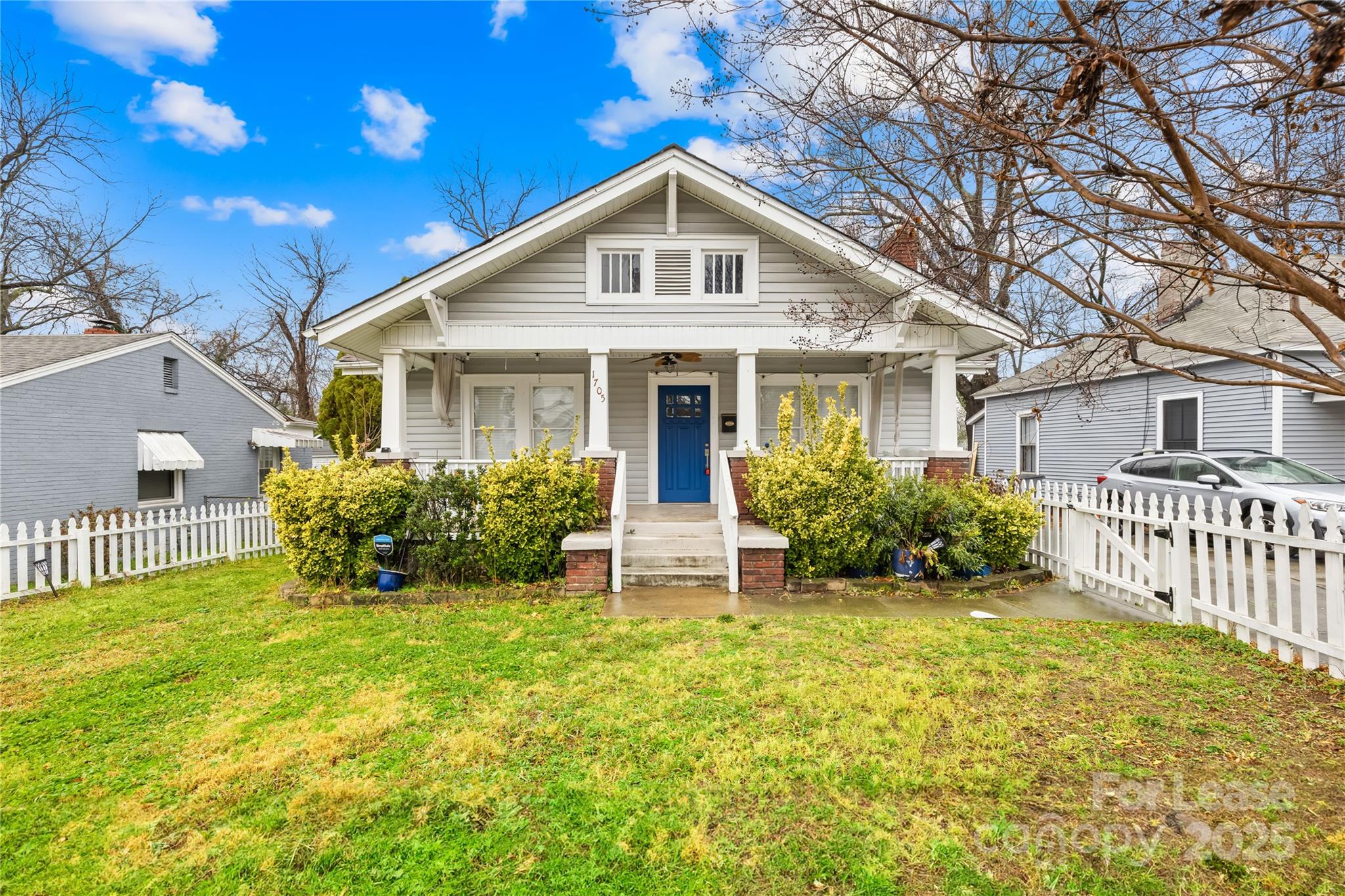 Discover this charming 3-bedroom, 1.5-bathroom bungalow near Plaza Midwood, offering private living with no HOA. Enjoy the classic white picket fence, cozy covered front porch, and a spacious backyard with a deck perfect for relaxing or entertaining.  
Inside, the single-story home features a welcoming living room with a fireplace, a kitchen with white cabinets and stainless-steel appliances, a dining area, and a laundry space. One of the three bedrooms includes an additional fireplace, complementing the full bathroom and half bath.  
Conveniently located near NODA, Plaza Midwood, and Uptown, you’ll be close to shopping, dining, and entertainment. Tenants handle utilities and lawn care. Applicants 18+ must pass screenings and provide proof of income.