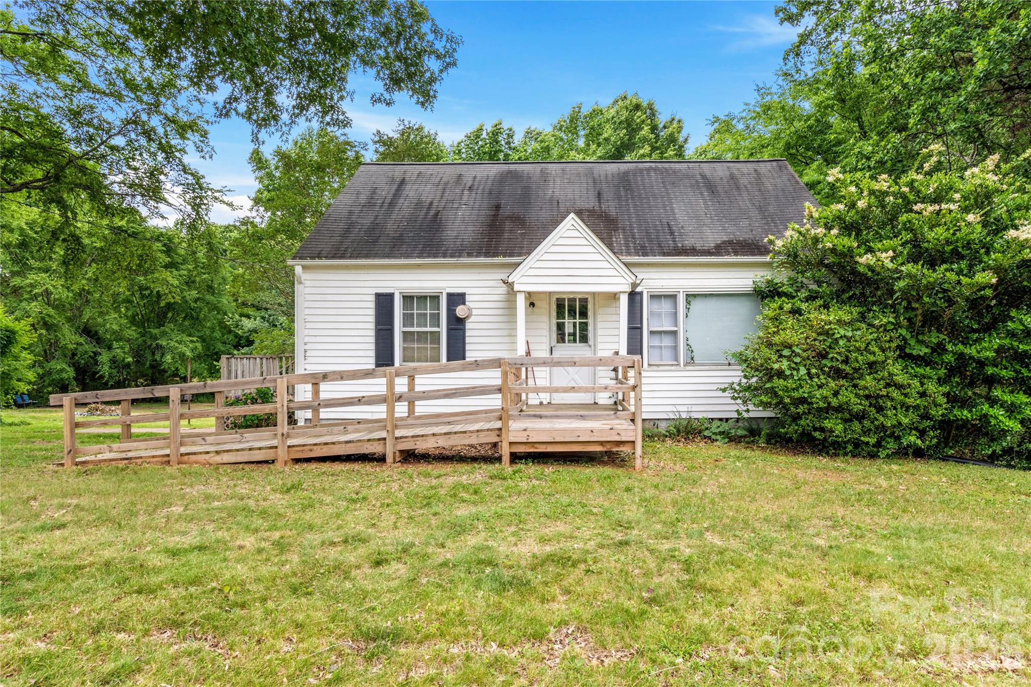 Affordable opportunity in Davie County! This 2-bedroom, 1-bath home sits on nearly 1 acre and offers solid value with a new hot water heater, washer/dryer connections, a detached carport with storage, and room to spread out — plus a bonus singlewide trailer on the property with its own separate septic system and shared well. Whether you're looking to add to your rental portfolio or secure a project with income potential, this one checks the boxes. Sold as-is. Schedule your showing today before it's gone.