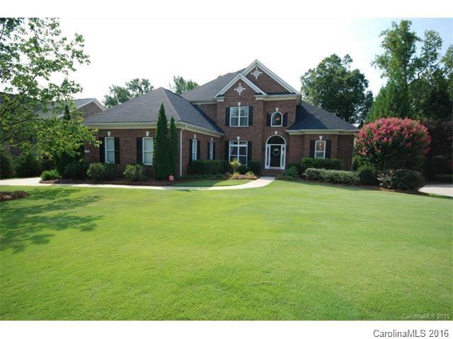 Looking for the perfect home in Fort Mill on private, wooded lot close to interstate, schools & shopping? Fabulous 3 story full brick home w/ side load garage and an unfinished basement w/10 ft ceilings for LOTS of additional SQFT for future homeowners. MBR suite & guest BR & BTH on main floor PLUS office & formal DR. Park like grounds are landscaped to perfection. Transitional plan with 2 story GRT RM w/ built ins. Hardwoods on much of main. Gorgeous kitchen w/ granite & tile backsplash.