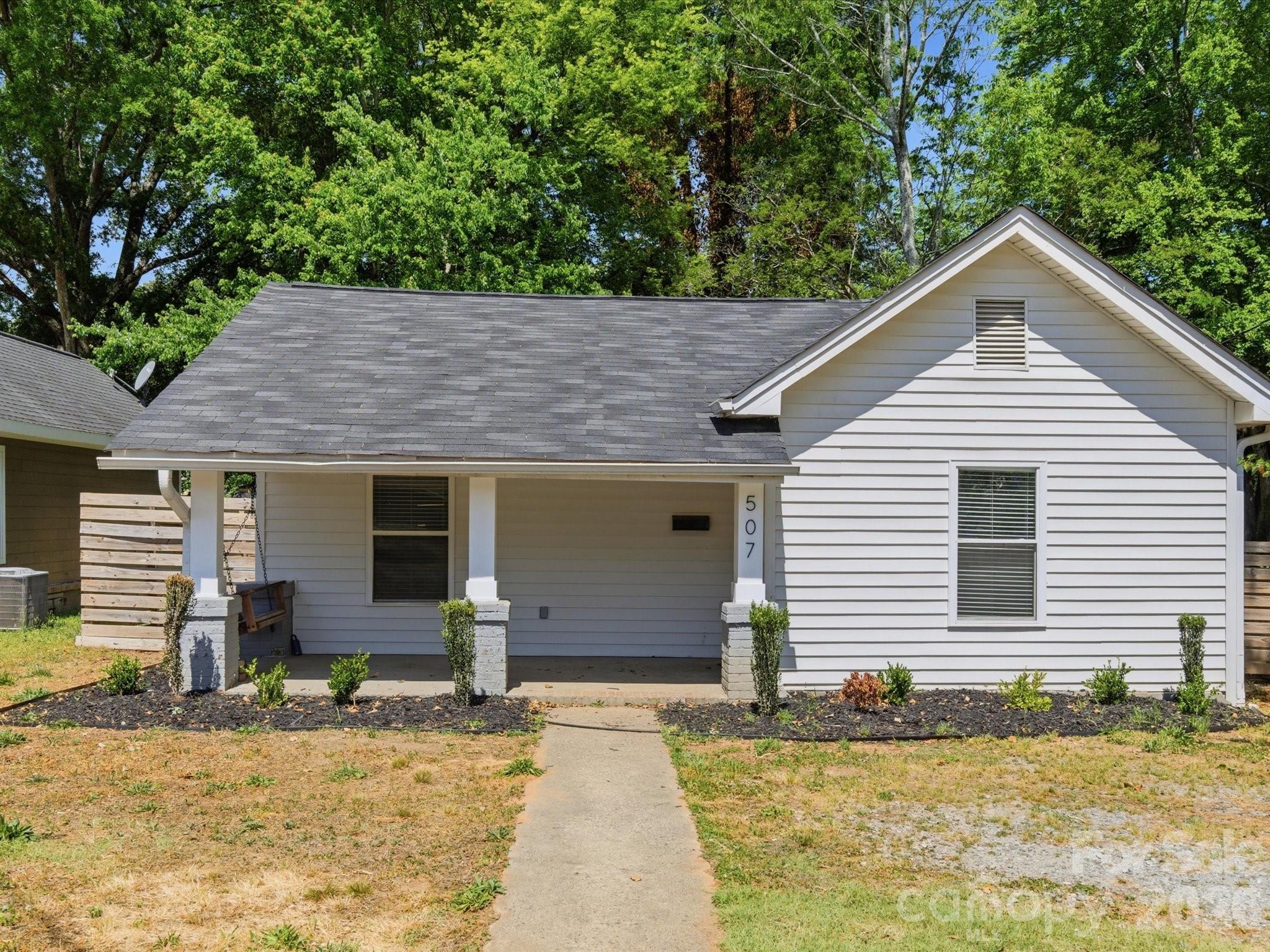 Updated, move-in ready, and perfectly sized for easy living in the heart of downtown Rock Hill, 
this 3-bedroom, 2-bath home packs a punch!  This property offers a smart, efficient layout with the flexibility to use one bedroom as a home office or guest space. At just over 1,000 square feet, every inch is thoughtfully utilized, creating a comfortable and functional flow without wasted space.
The kitchen has been updated with modern cabinetry, stainless steel appliances, and a clean, stylish backsplash, opening into a bright living area with durable flooring throughout. Both bathrooms have been refreshed, giving the home a clean, low-maintenance feel that’s truly move-in ready.

Step outside to a large fenced-in backyard with plenty of room to entertain, garden, or simply enjoy the space... plus a storage shed for added convenience! The covered front porch with Southern porch swing adds charm and the perfect spot to unwind.  With a little bit of landscaping TLC and an eye for design, this home will be the most charming on the block!

Located just minutes from Winthrop University, restaurants, parks, and downtown Rock Hill, this home offers a lifestyle that’s hard to find at this price point.
Previously used as a successful rental property, this home also presents a strong opportunity for investors looking for a turnkey addition to their portfolio.
Affordable, updated, and versatile; whether you’re looking for a place to call home or an income-producing property, this one checks the boxes.