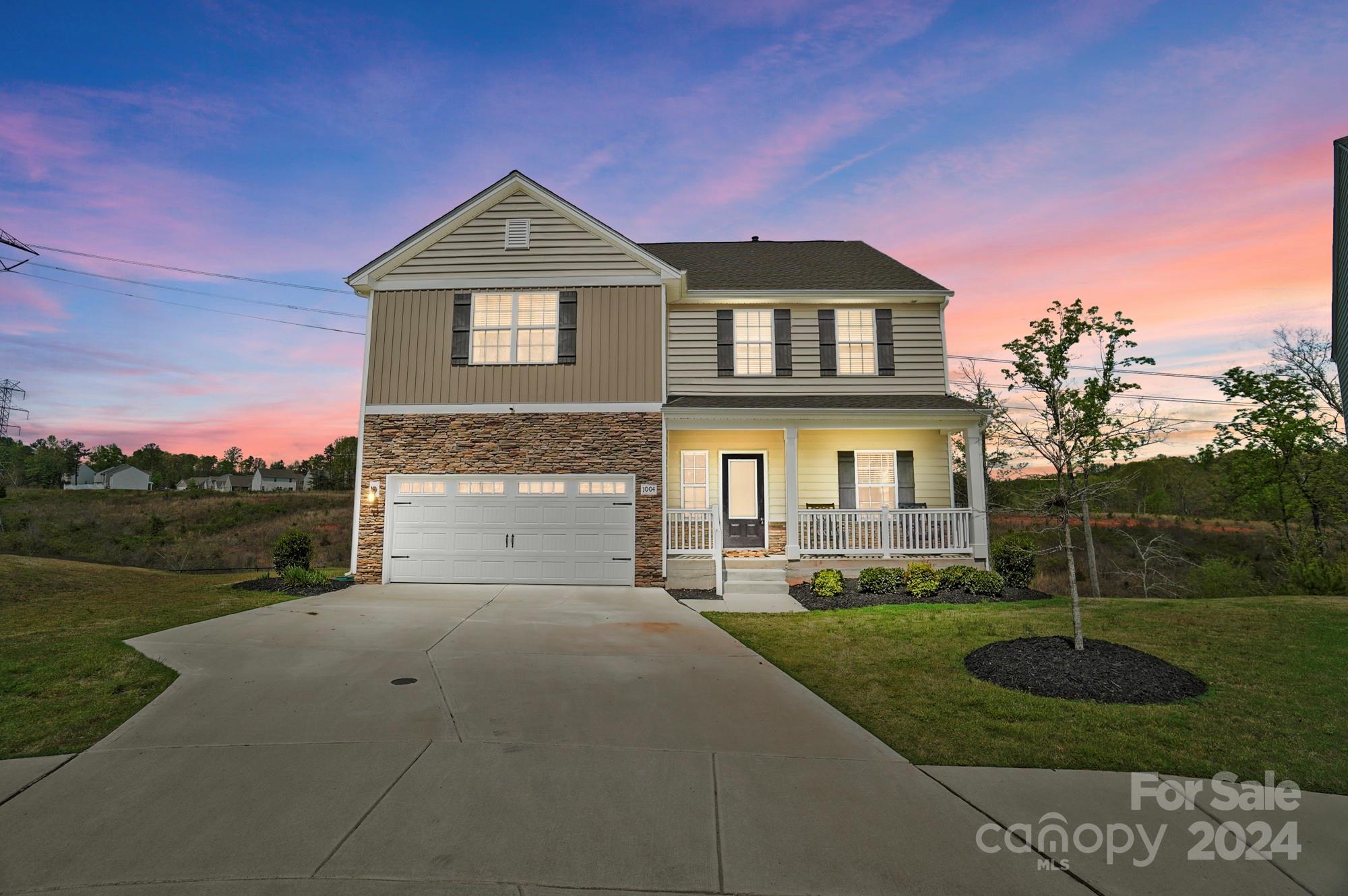 Welcome to this 5-bedroom pristine home in Fort Mill. Nestled on a quiet cul-de-sac, this walk-out Basement home is like no other! Start at the charming front porch and inside discover an inviting great room w/modern fireplace, a versatile flex room w/ closet, providing endless possibilities as a living room, study or formal dining room. Indulge your culinary desires in the immaculate kitchen featuring white cabinets, stainless steel appliances, gas stove, granite counters, a large walk-in pantry, and an expansive island. Convenience meets style with a half bath adorned with wainscoting, large laundry room, leading to the 2-car garage with epoxy flooring. Upstairs, find five spacious bedrooms, including a luxurious master bedroom with cathedral ceilings, large ensuite bath boasting a standing shower and garden tub. Customize the 1200 sq.ft of unfinished basement or expand the main floor living area to include a deck or  to soak in the beauty of the surrounding nature preserve!