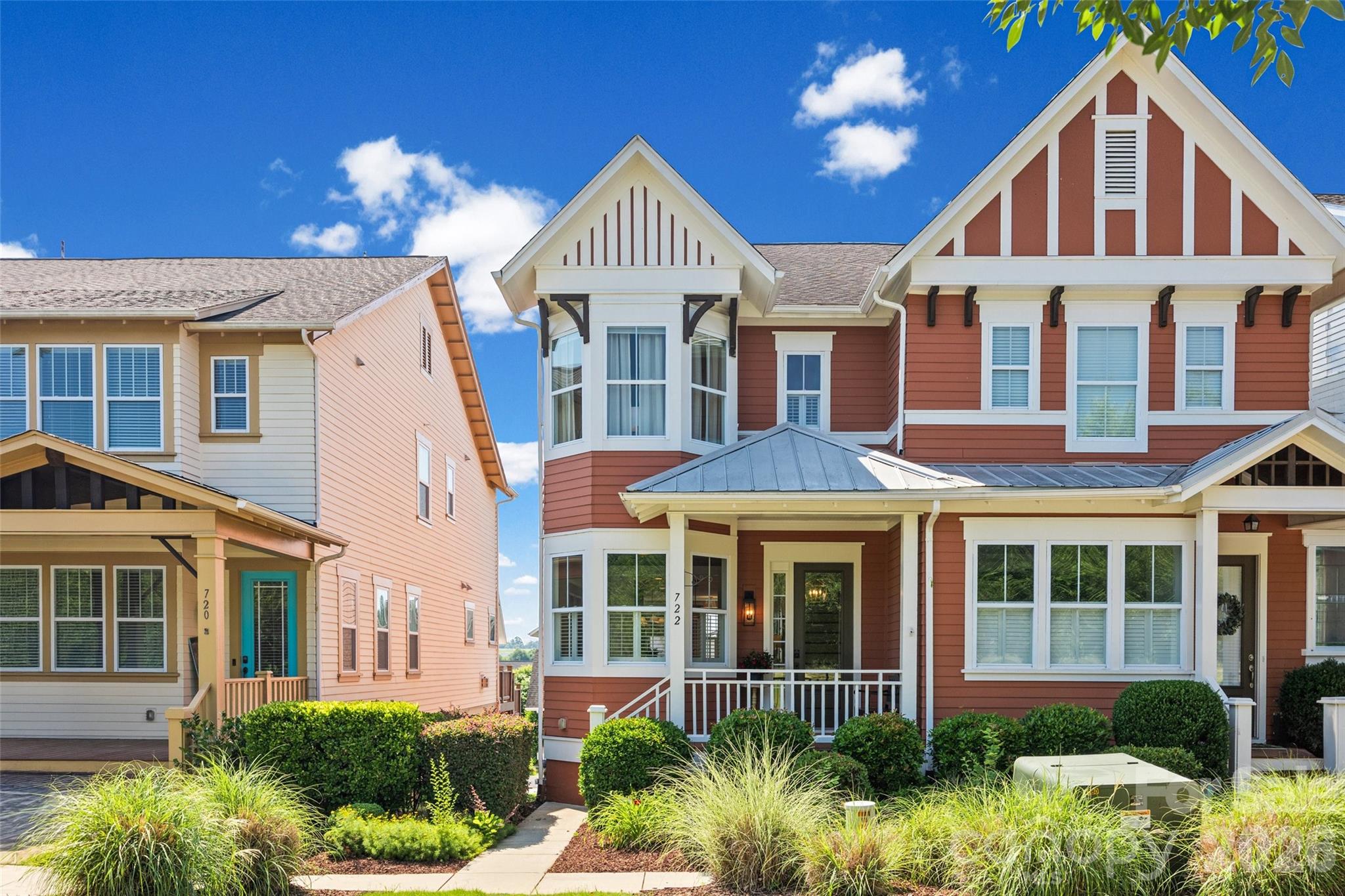 Welcome to this beautifully remodeled townhome in one-of-a-kind Riverwalk. Originally constructed by Saussy Burbank, the higher quality of construction continues to boast a timeless charm. This must-see property features solid hardwoods throughout the lower and upper level, hand crafted shelving in the study with a bay window, built-ins around the gas fireplace, closet systems by Closets by Design, and custom window treatments with designer fabric in the dining room. The remodeled kitchen is a show-stopper with Calcutta Gold quartz countertops, tile backsplash, under cabinet lighting, and stainless steel appliances including the gas stove. The upper level showcases three bedrooms with beautiful views, natural light, laundry, storage, and renovated bathrooms. The HOA covers ALL exterior maintenance for this section of townhomes, and includes a pool membership, plus miles of riverside walking trails, the velodrome, playground, and more. Plus, street parking makes this property particularly accessible for guests. Luxury meets low maintenance in this move-in-ready townhome just minutes from I-77.