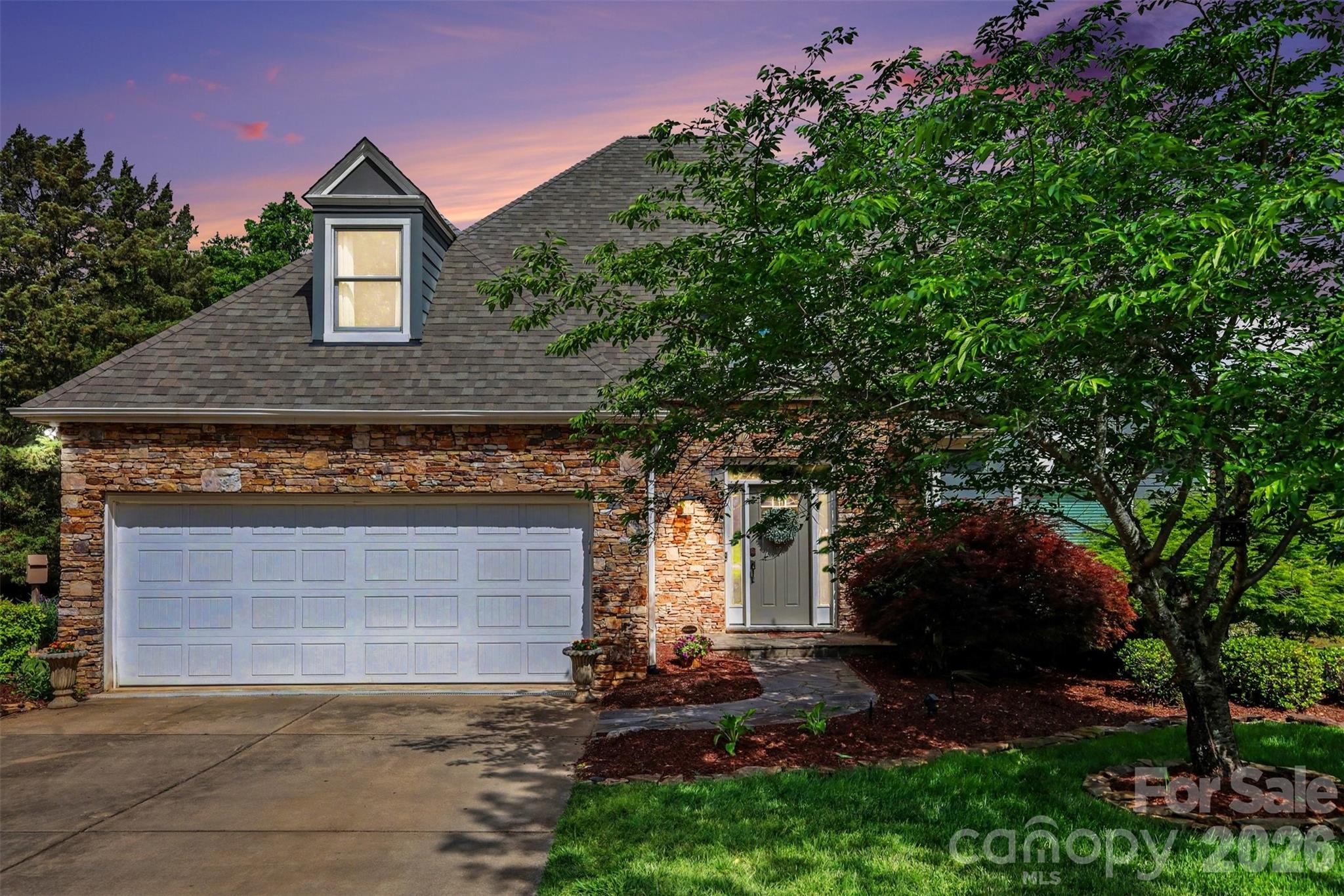 Waterfront living in amenity-rich Bailiwyck! Perfectly positioned along the community pond, this Fort Mill home offers peaceful water views & a backyard designed to be enjoyed—featuring a full deck plus a charming 3-season room that lets you take in the setting year-round. Inside, the open layout feels bright & inviting w/ the primary suite & laundry on the main for easy everyday living. The kitchen was thoughtfully updated in 2021 w/ custom cabinetry, quartz countertops, subway tile backsplash, double ovens & SS appliances, plus a new dishwasher in 2026. Recent improvements include brand new LVP flooring (2026), roof (2025), 7 new windows (2025), upstairs HVAC (2021) & garage door (2021), giving you peace of mind from day one. Step outside to unwind, entertain, or launch a kayak right from your backyard. Bailiwyck offers a true neighborhood feel w/ a clubhouse, pool, tennis courts w/ pickleball lines, playground, greenway trails & an active social calendar—making it easy to feel right at home!